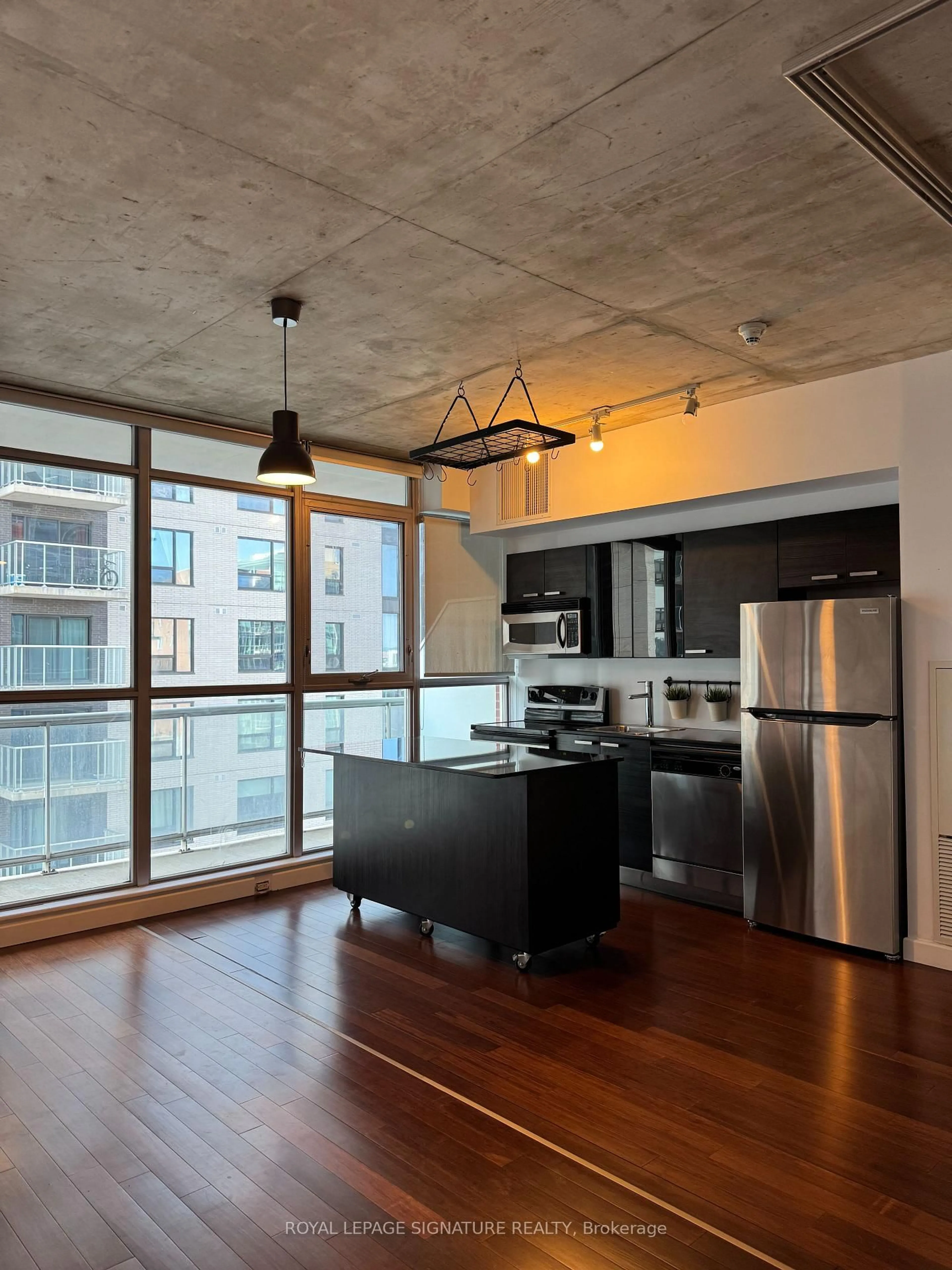 Open concept kitchen, cement floor for 179 GEORGE St #1004, Ottawa Ontario K1N 1J8