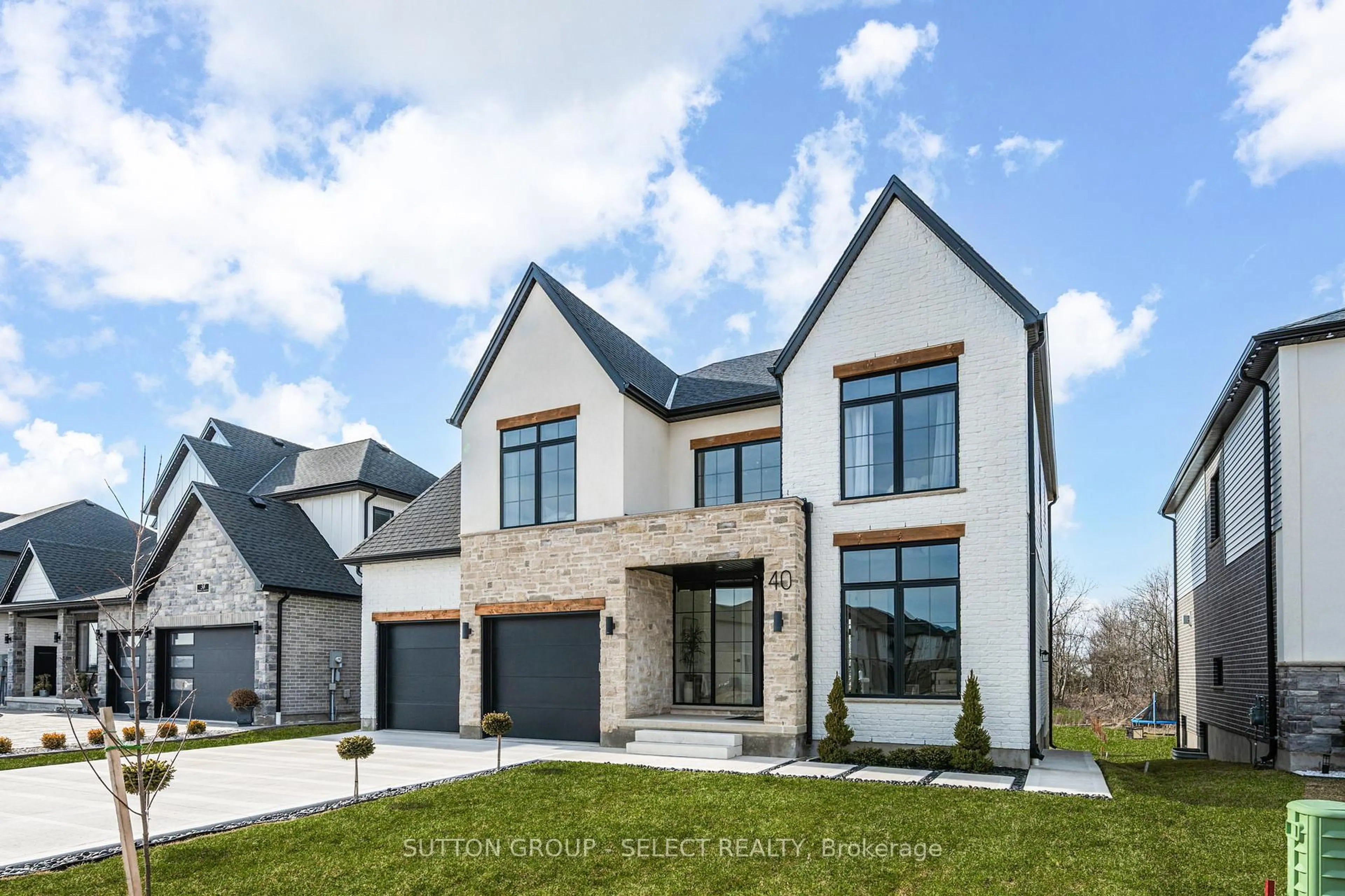 Home with brick exterior material, street for 40 Royal Cres, Southwold Ontario N5P 0G5