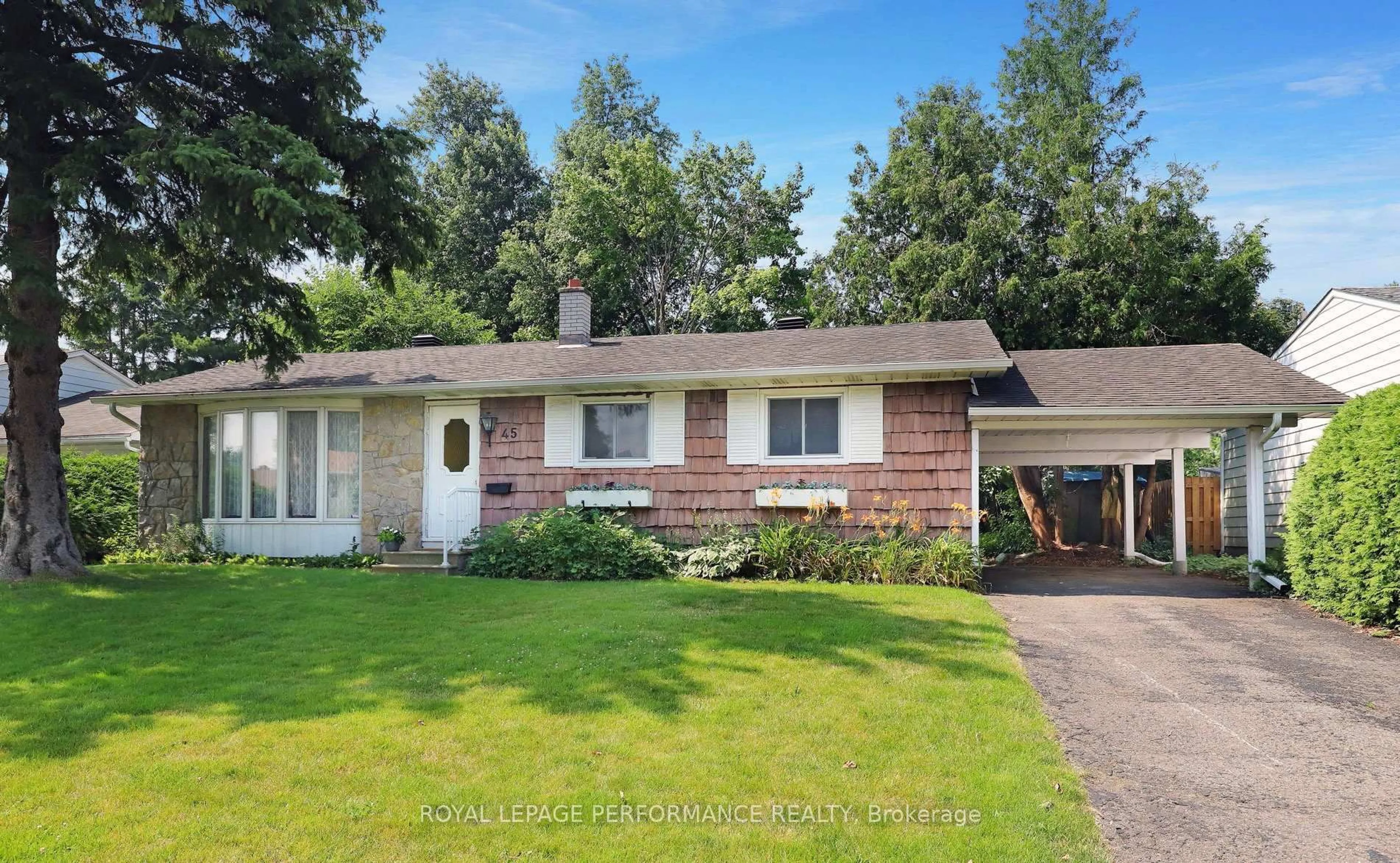 Home with vinyl exterior material, street for 45 Keewatin Cres, Ottawa Ontario K2E 5S2