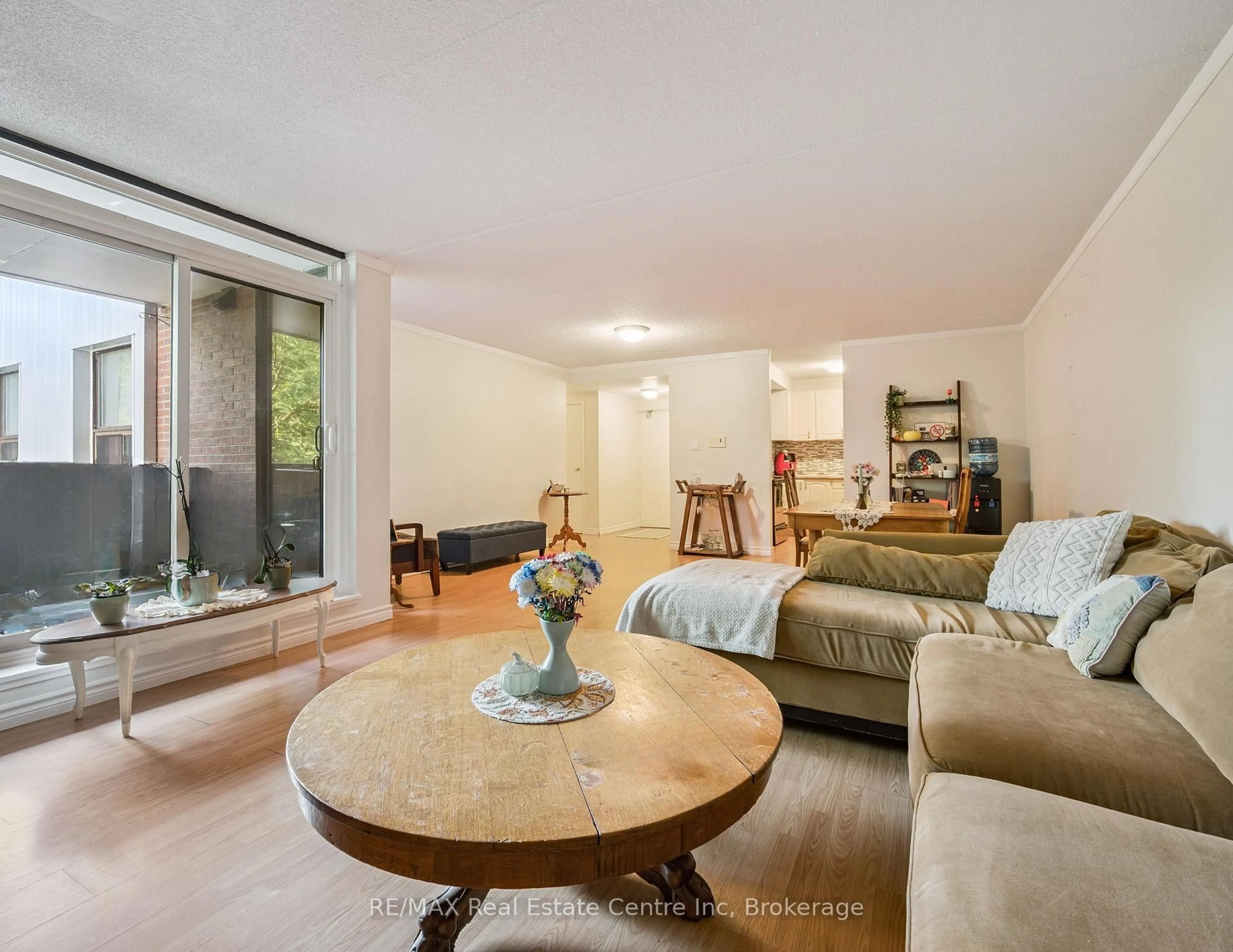 Living room with furniture, unknown for 65 Silvercreek Pkwy #310, Guelph Ontario N1H 7R9