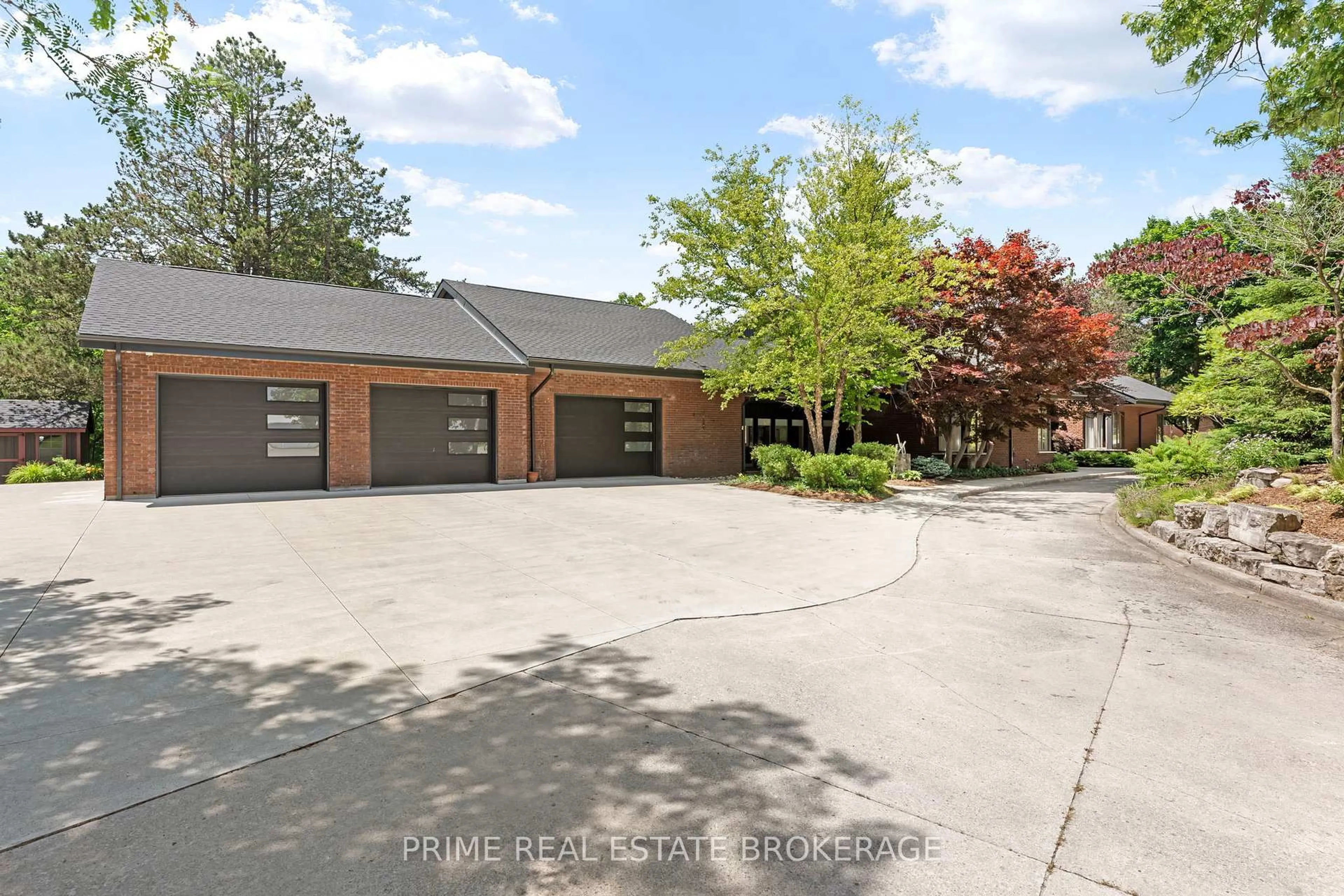 A pic from outside/outdoor area/front of a property/back of a property/a pic from drone, street for 203 Riverside Dr, South Huron Ontario N0M 1S3