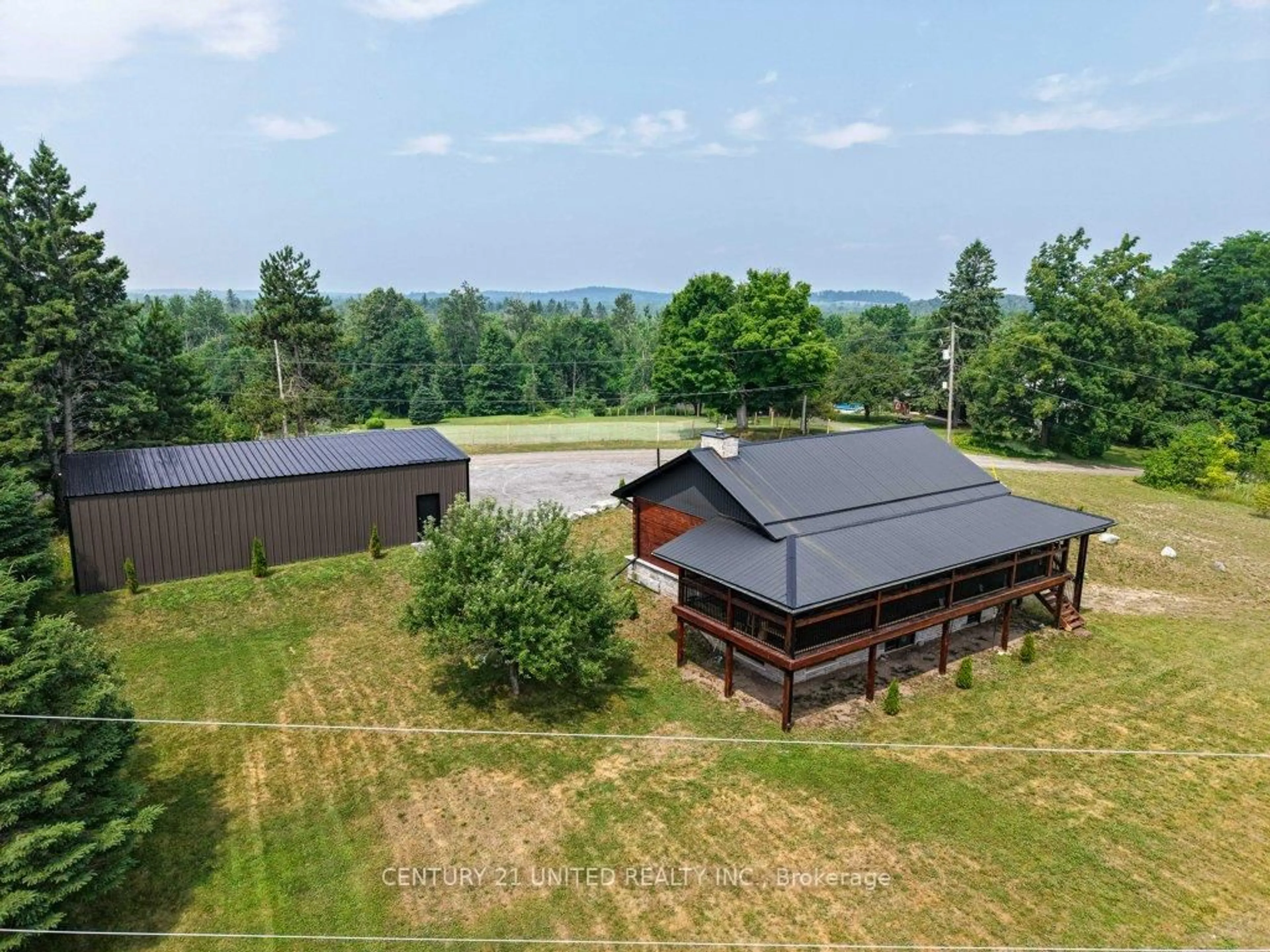 A pic from outside/outdoor area/front of a property/back of a property/a pic from drone, mountain view for 20 Bell Rd, Limoges Ontario K0K 2M0