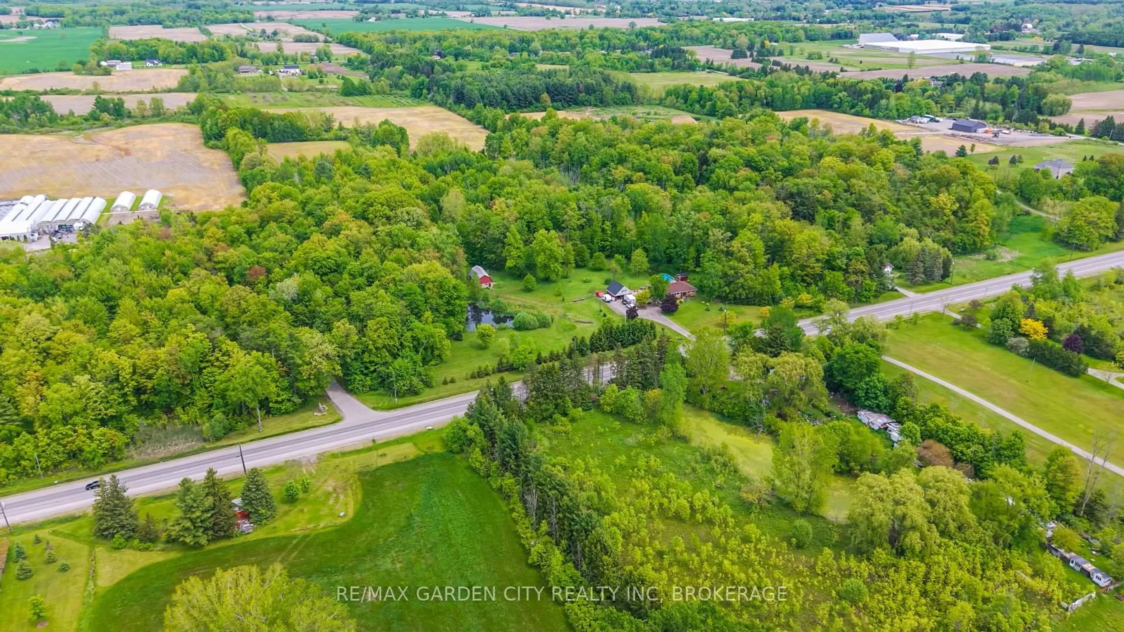 A pic from outside/outdoor area/front of a property/back of a property/a pic from drone, forest/trees view for 851 Hwy 20 W, Pelham Ontario L0S 1C0