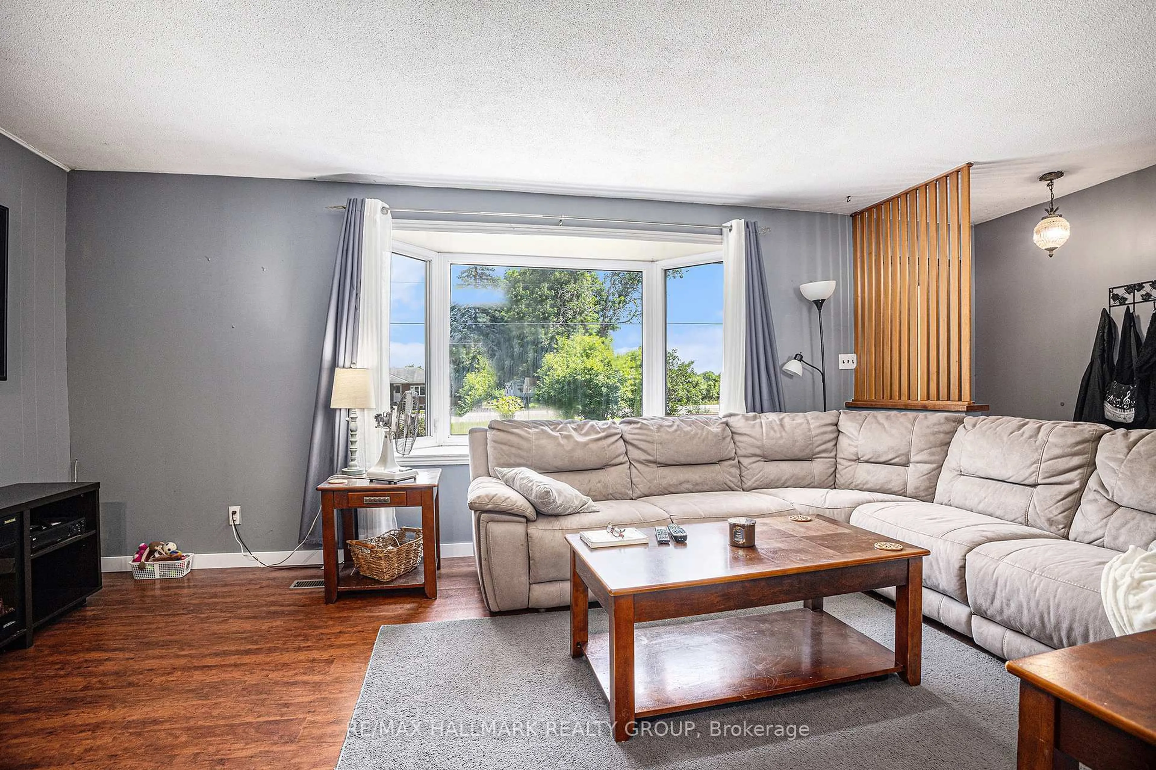 Living room with furniture, wood/laminate floor for 3504 County Road 26 Rd, Augusta Ontario K0E 1T0