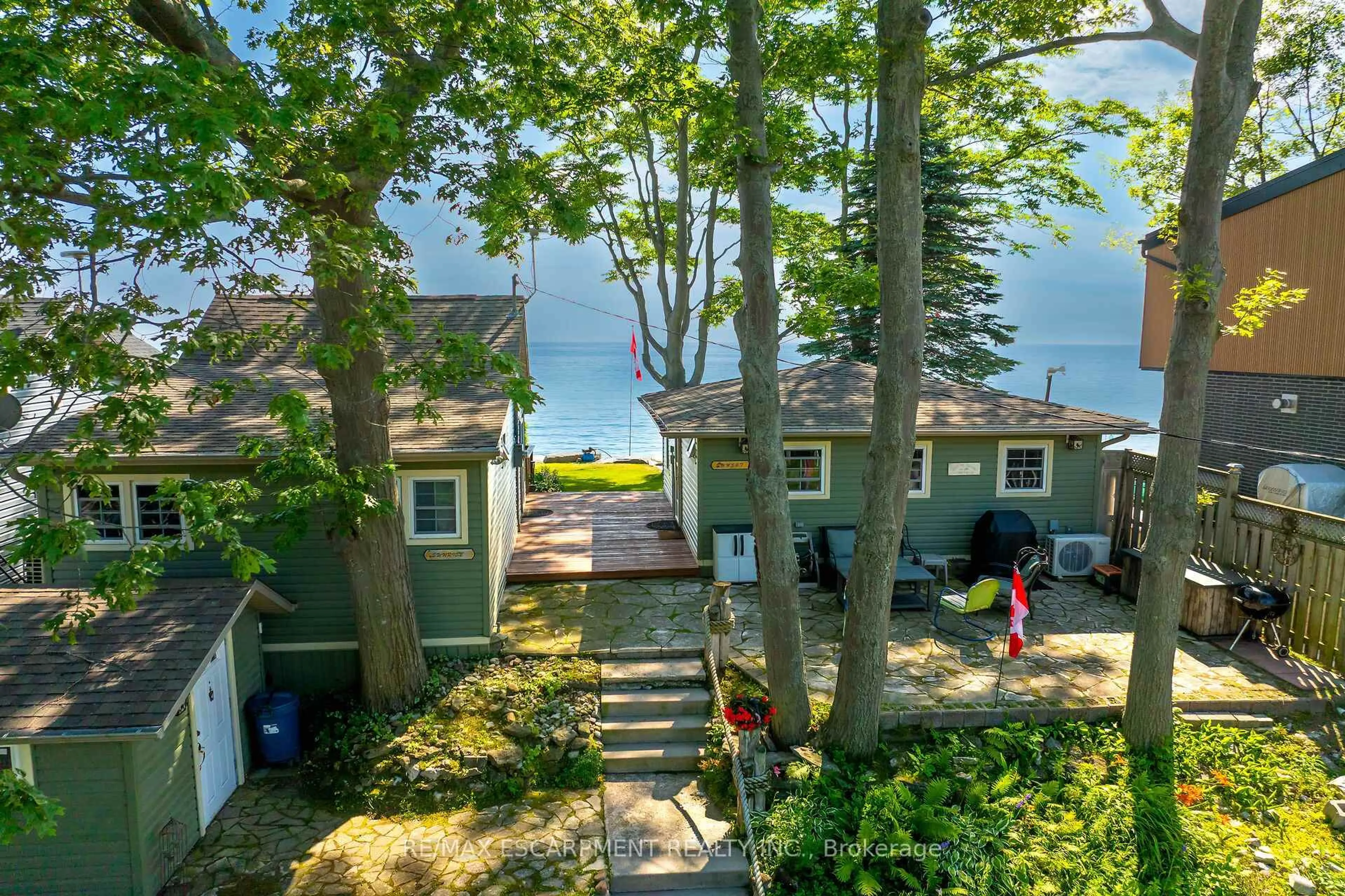A pic from outside/outdoor area/front of a property/back of a property/a pic from drone, water/lake/river/ocean view for 803 Sandy Bay Rd, Haldimand Ontario N1A 2W6