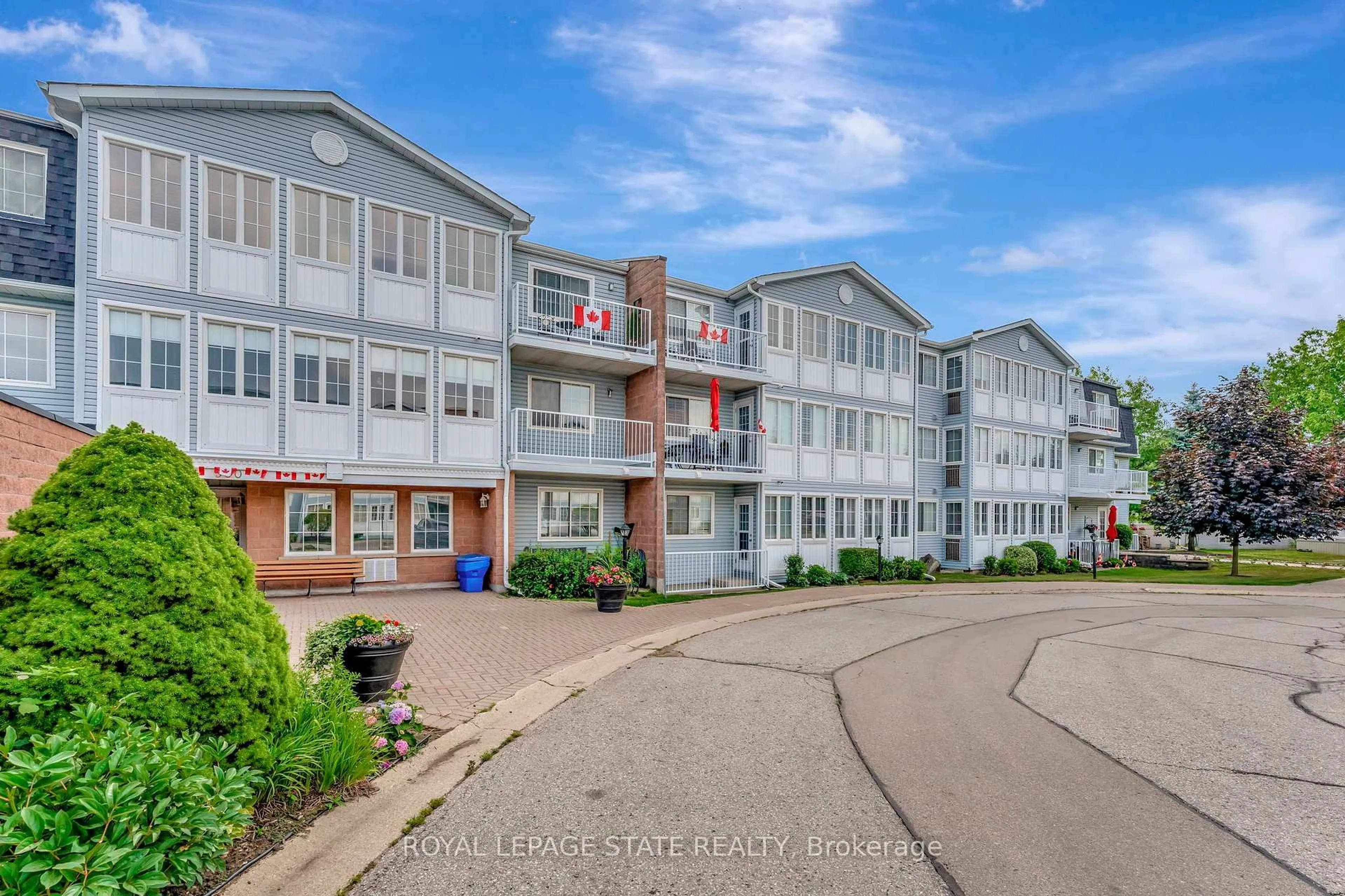 A pic from outside/outdoor area/front of a property/back of a property/a pic from drone, unknown for 500 Silverbirch Blvd #101, Hamilton Ontario L0R 1W0