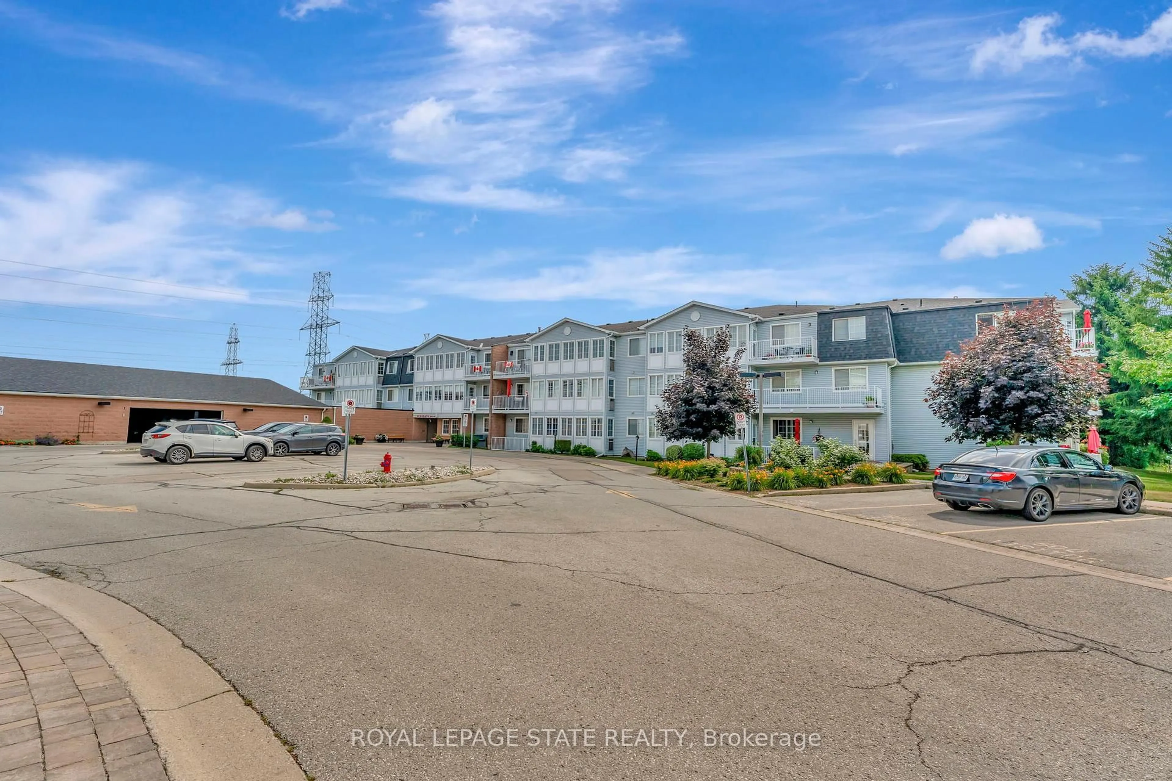 A pic from outside/outdoor area/front of a property/back of a property/a pic from drone, unknown for 500 Silverbirch Blvd #101, Hamilton Ontario L0R 1W0
