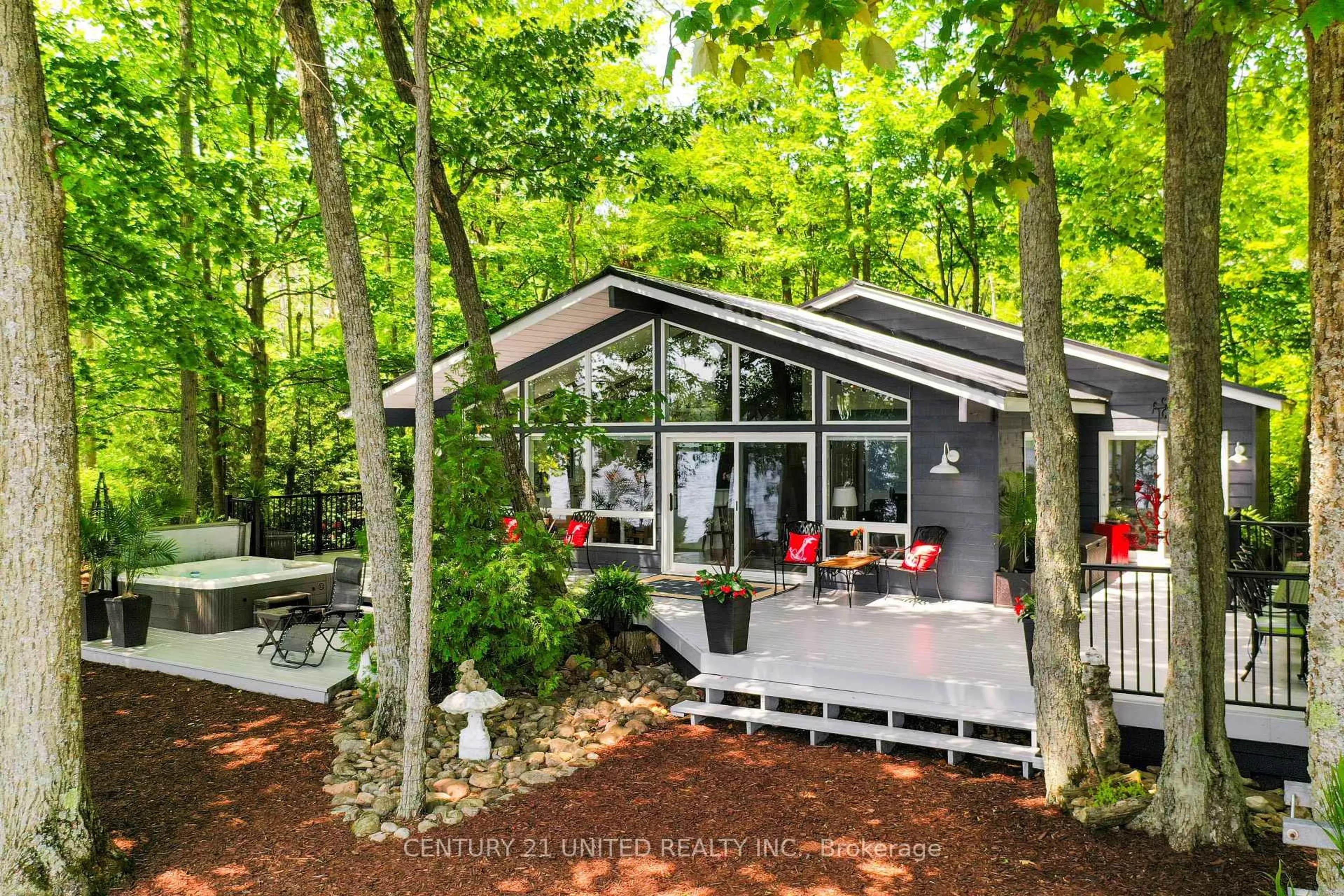 Home with vinyl exterior material, forest/trees view for 7004 Island 70, Trent Lakes Ontario K0L 1T0