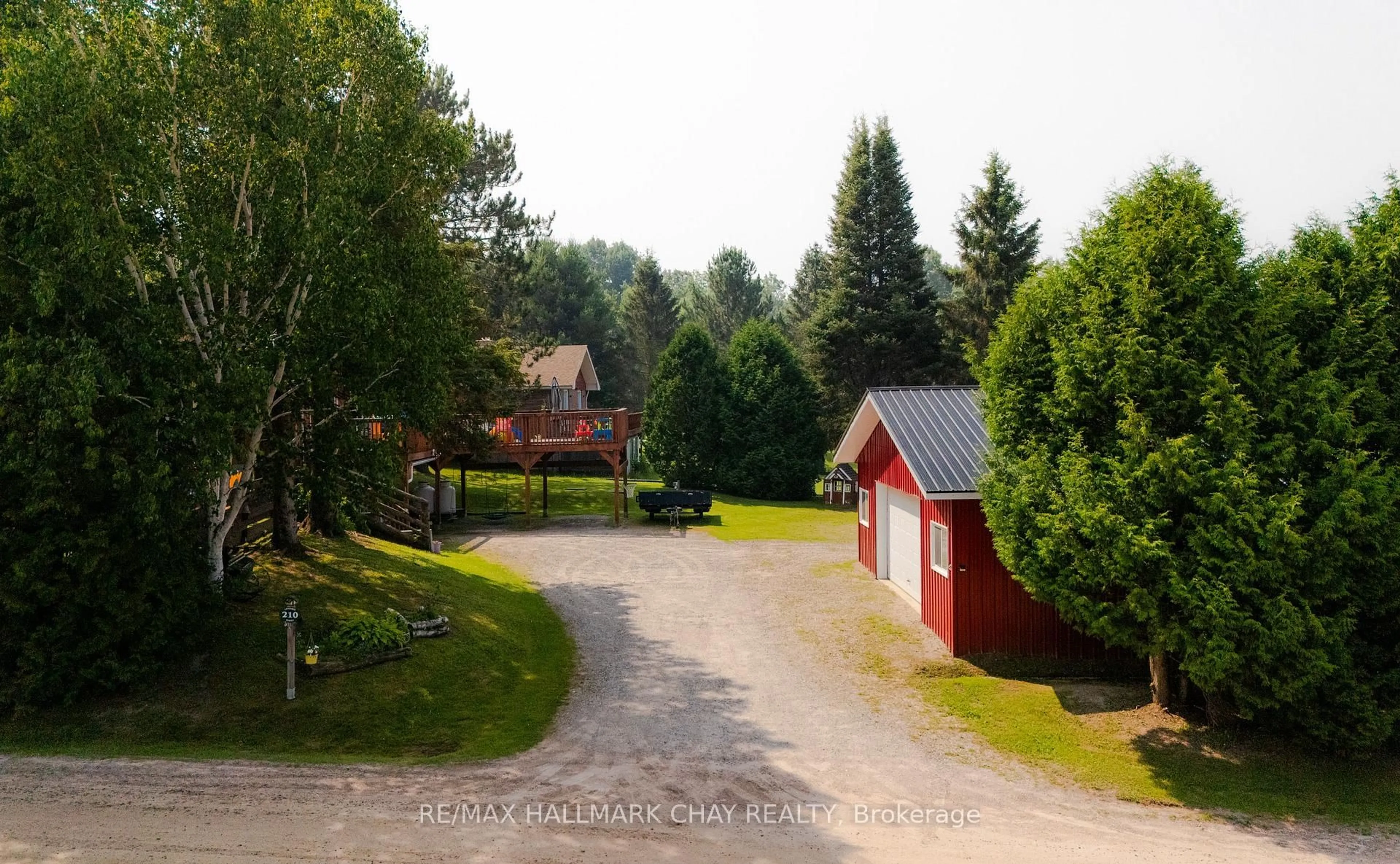 A pic from outside/outdoor area/front of a property/back of a property/a pic from drone, street for 210 Levesque St, Bonfield Ontario P0H 1E0