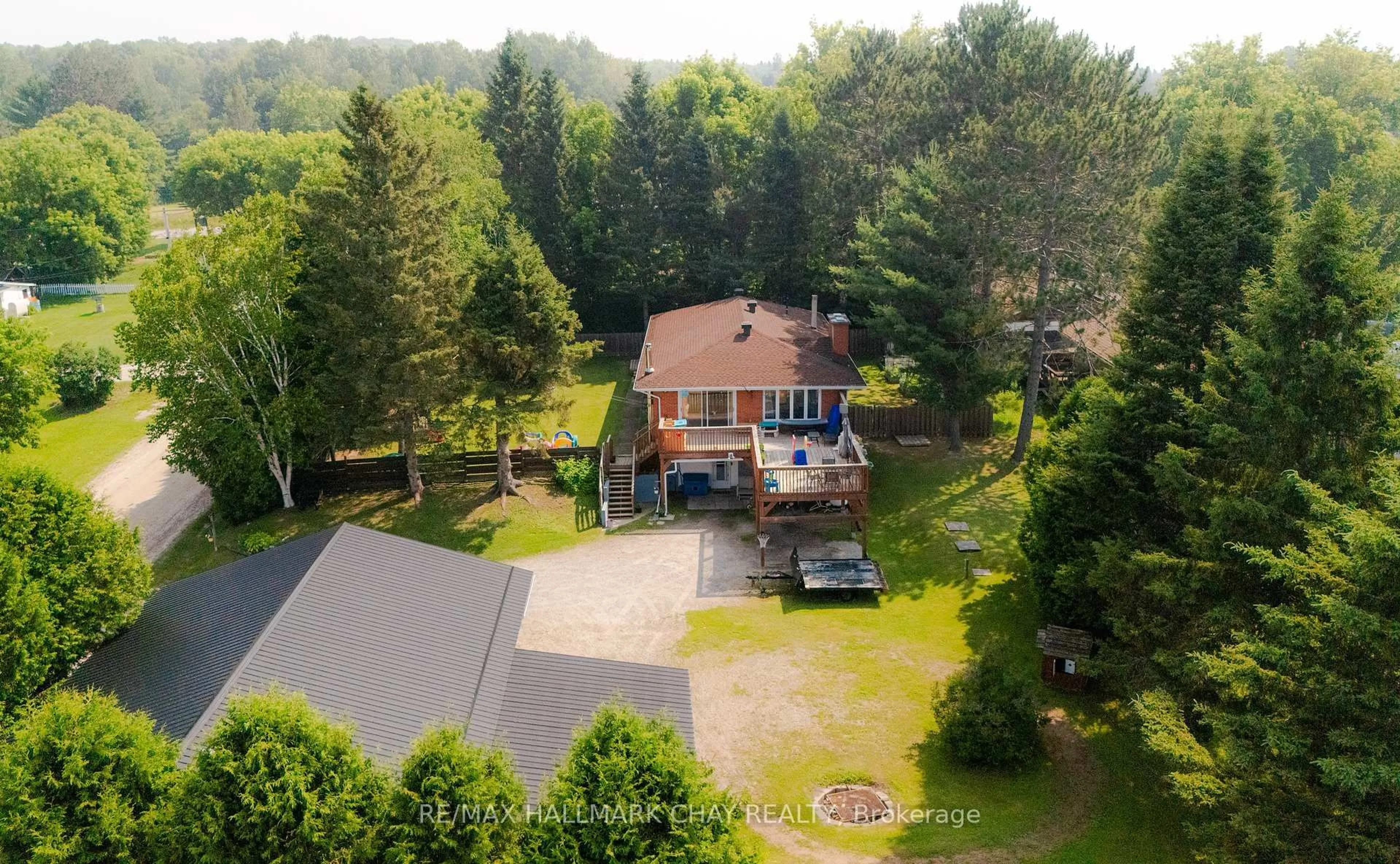 A pic from outside/outdoor area/front of a property/back of a property/a pic from drone, unknown for 210 Levesque St, Bonfield Ontario P0H 1E0