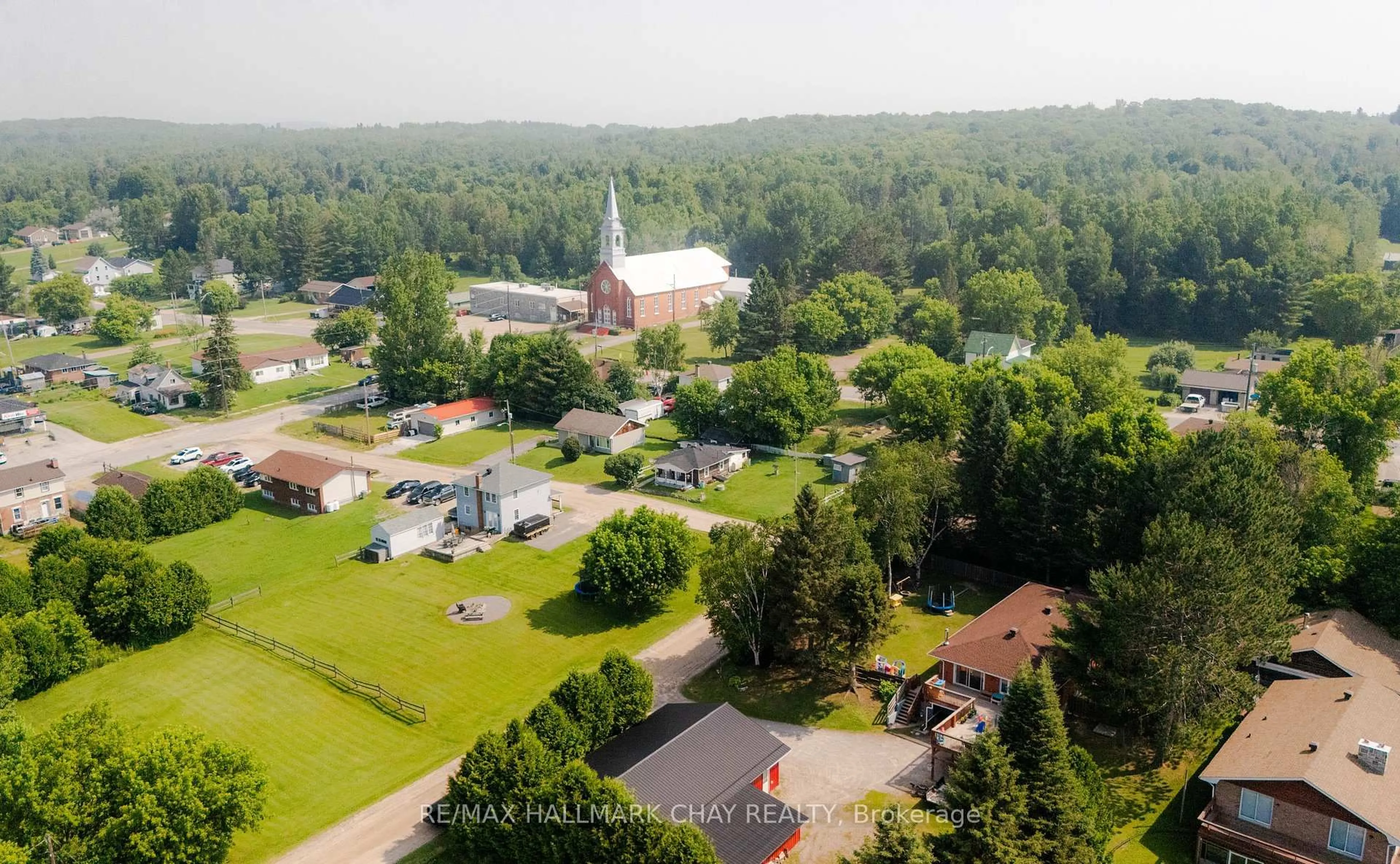 A pic from outside/outdoor area/front of a property/back of a property/a pic from drone, mountain view for 210 Levesque St, Bonfield Ontario P0H 1E0