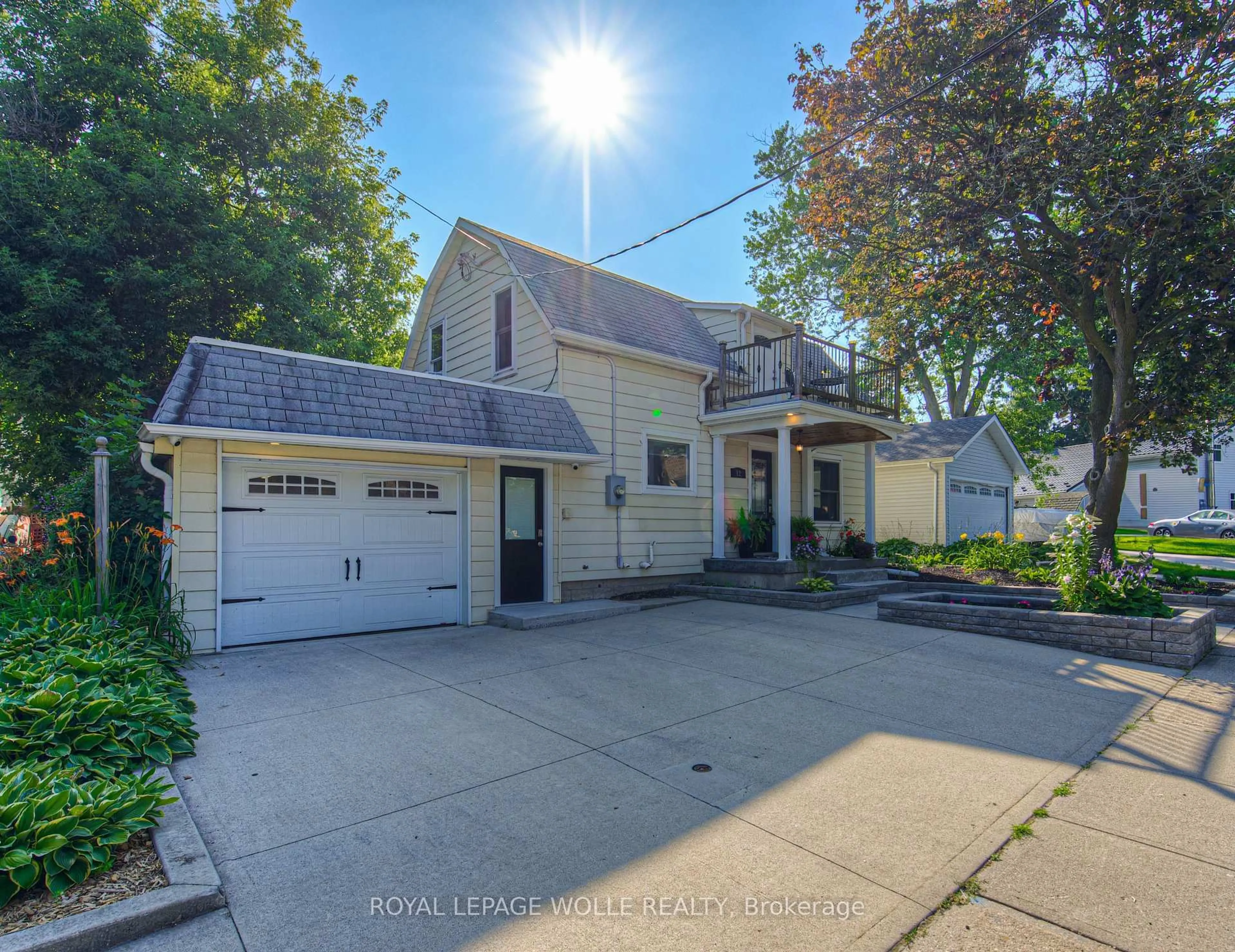 A pic from outside/outdoor area/front of a property/back of a property/a pic from drone, street for 12 Queen St, Wilmot Ontario N3A 2N1