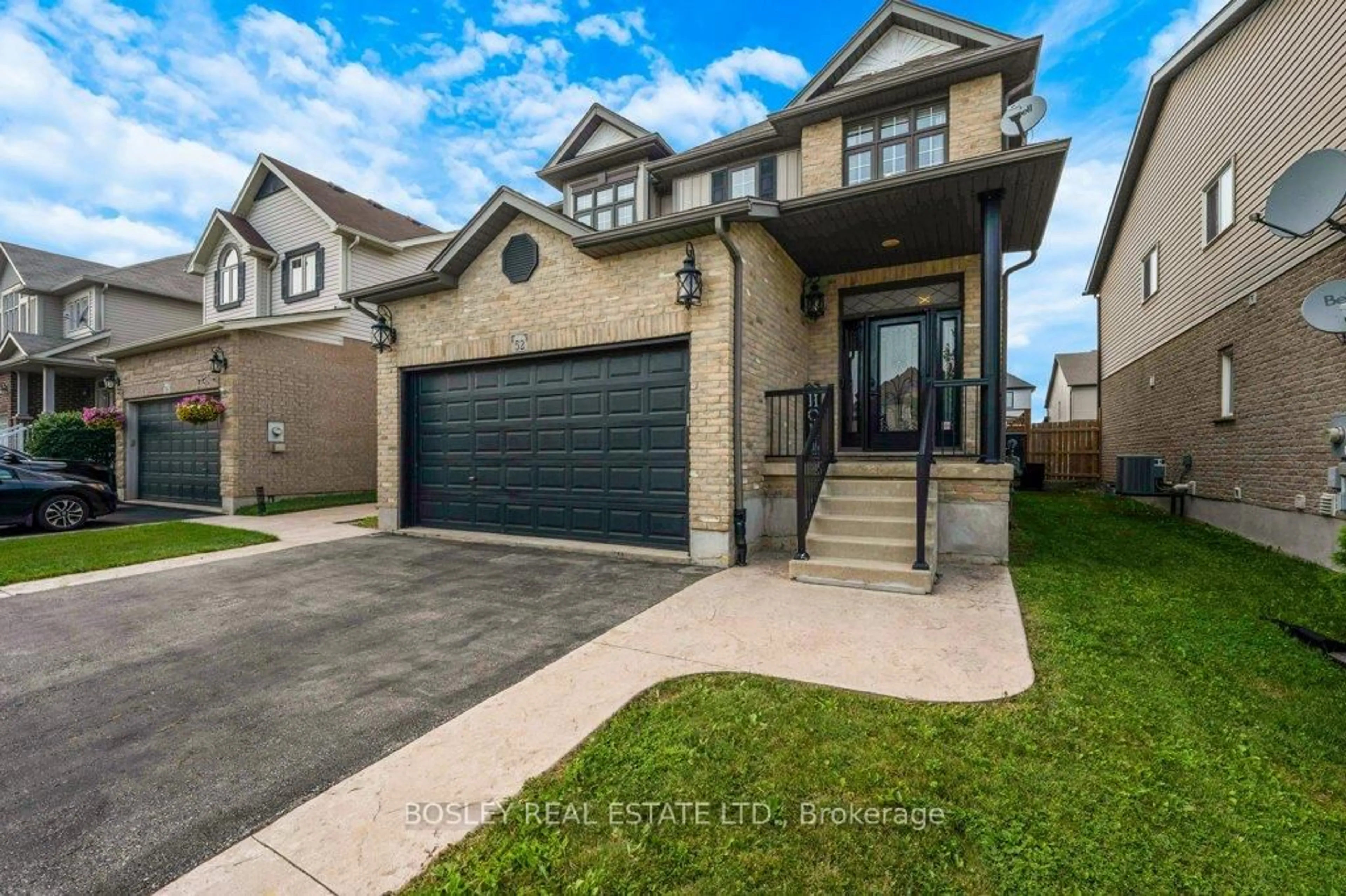 Home with brick exterior material, street for 52 Seabrook Dr, Kitchener Ontario N2R 1Y1