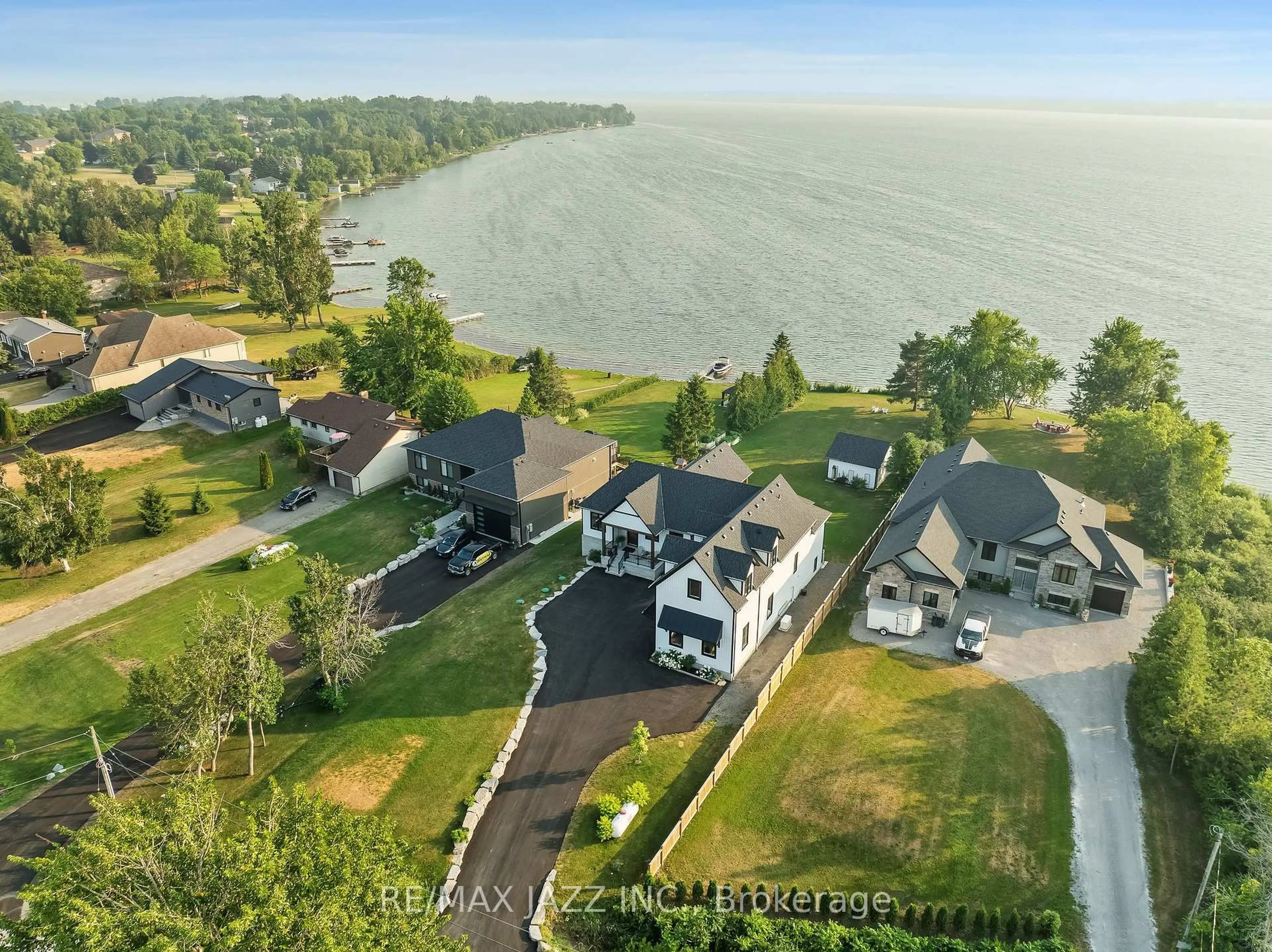 A pic from outside/outdoor area/front of a property/back of a property/a pic from drone, water/lake/river/ocean view for 48 Pleasant View Cres, Kawartha Lakes Ontario K0M 2C0