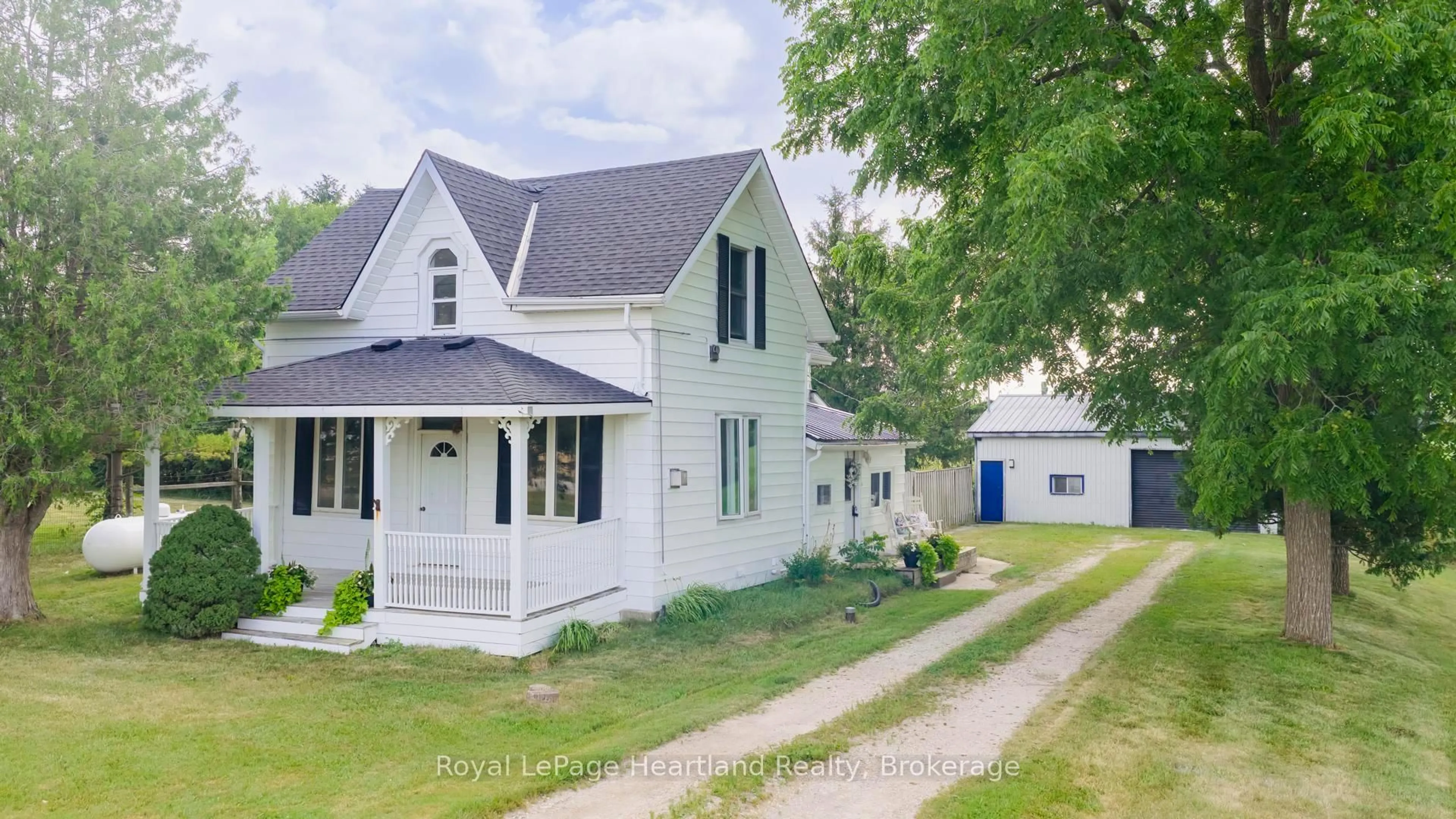 A pic from outside/outdoor area/front of a property/back of a property/a pic from drone, street for 80564 Baseline Rd, Central Huron Ontario N0M 1L0