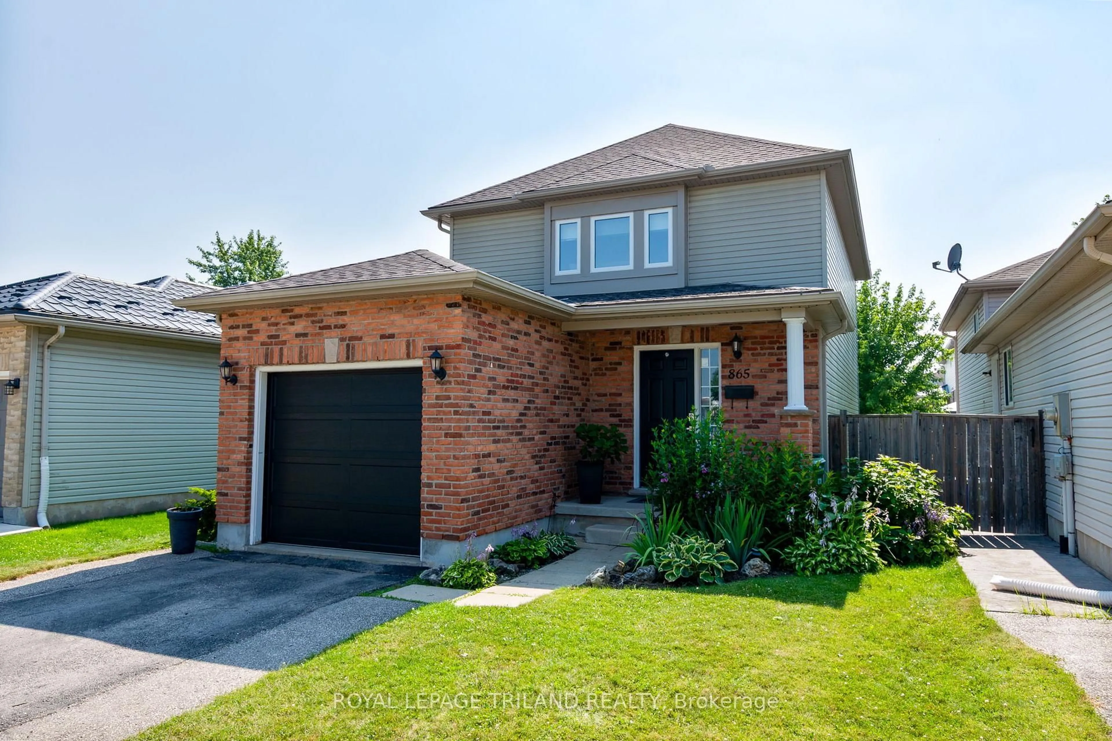 Home with brick exterior material, street for 865 South Wenige Dr, London North Ontario N5X 4G9