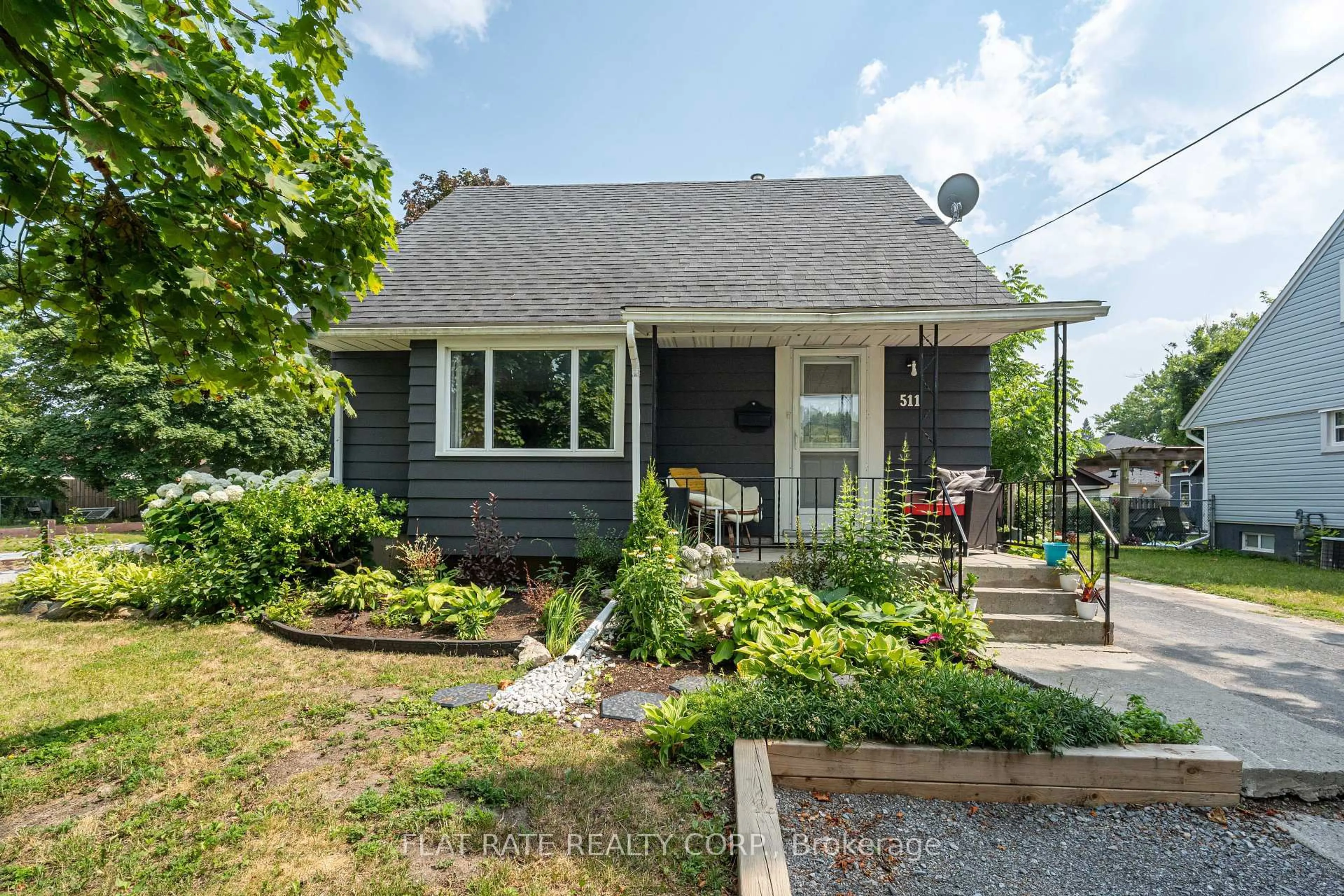 Home with vinyl exterior material, street for 511 O'Connell Rd, Peterborough South Ontario K9J 4E2