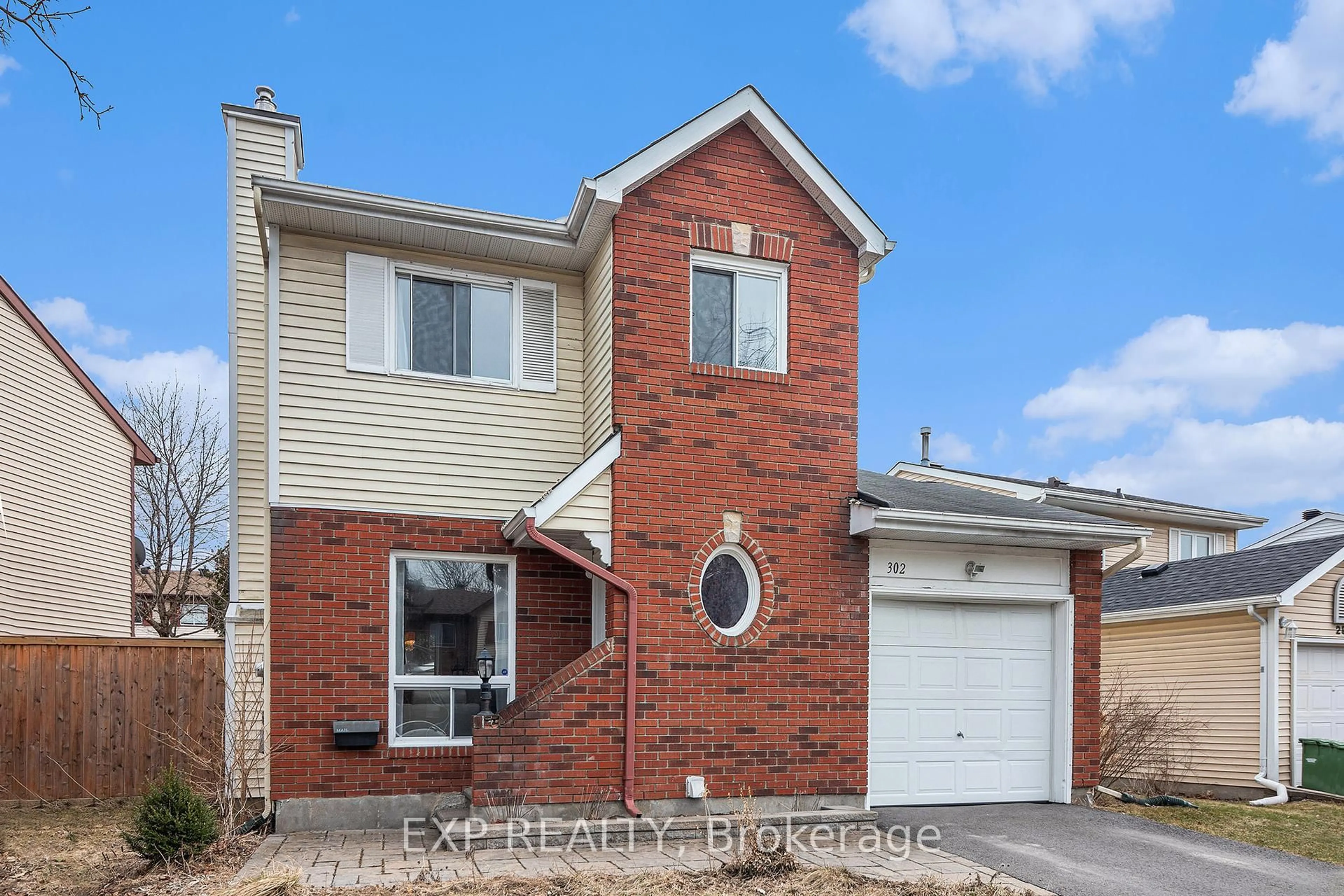 Home with brick exterior material, street for 302 Cote-Royale Cres, Ottawa Ontario K1E 3L7