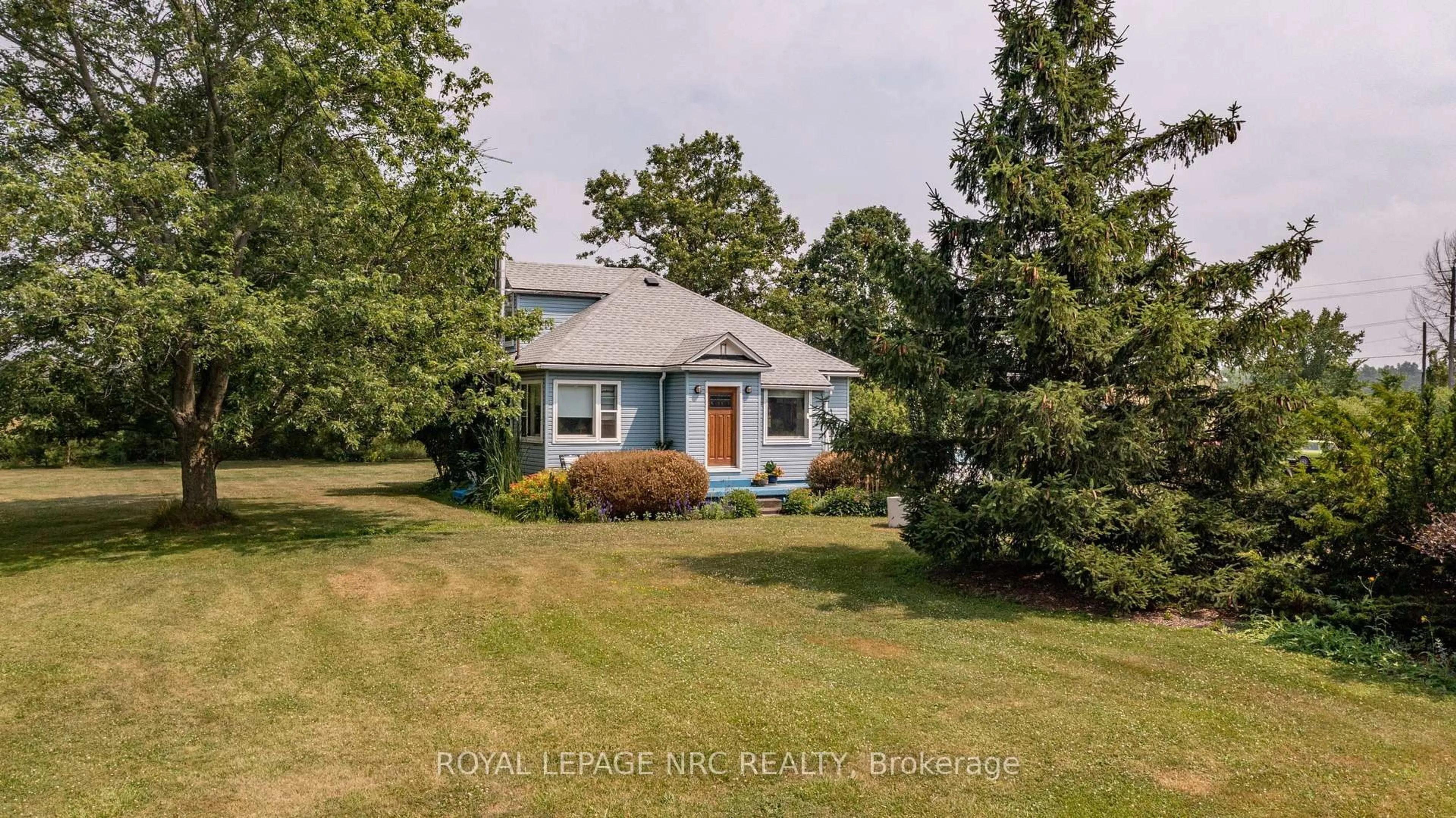 A pic from outside/outdoor area/front of a property/back of a property/a pic from drone, street for 4049 Yager Rd, Port Colborne Ontario L3K 5V5