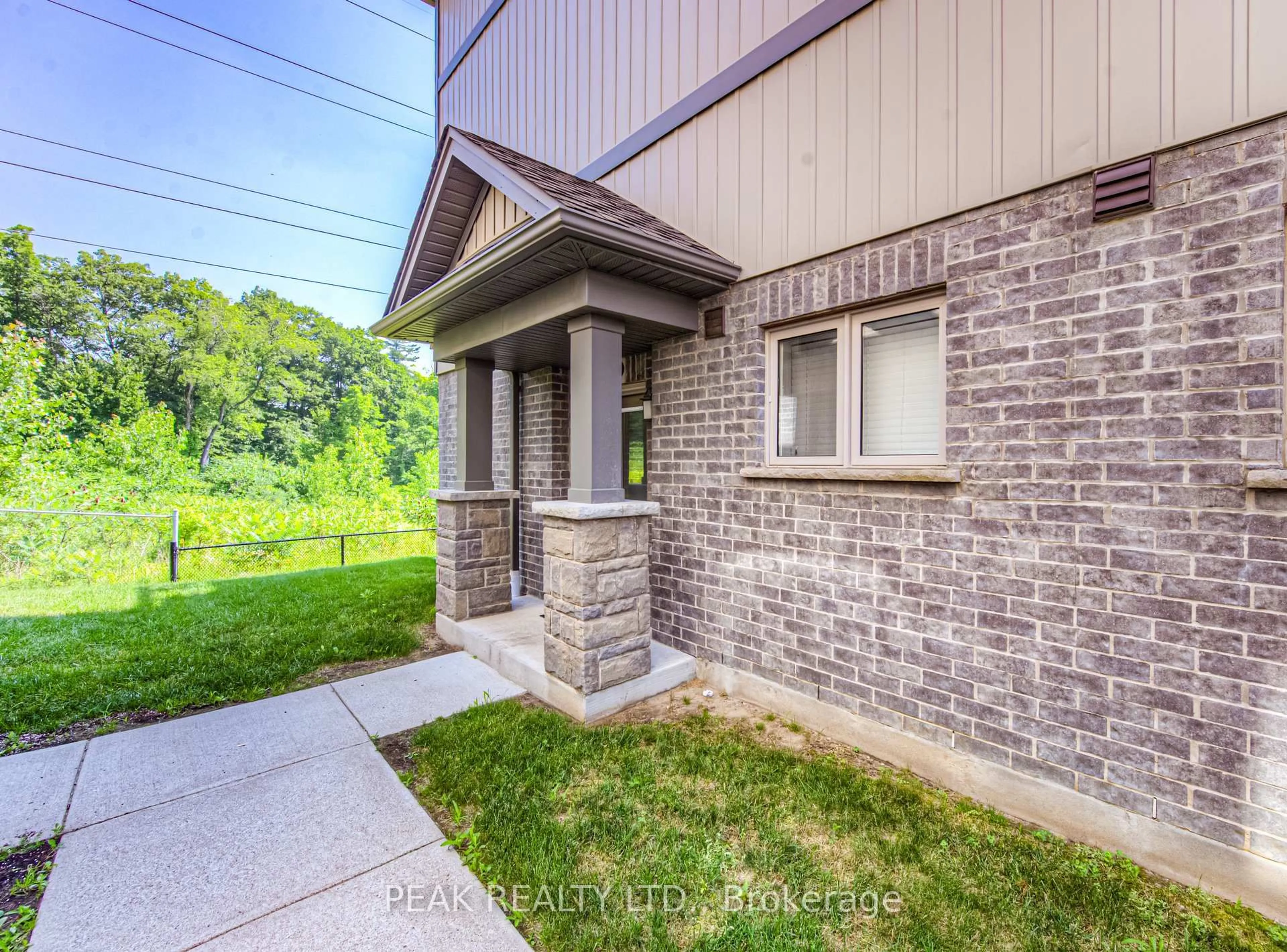 Home with brick exterior material, unknown for 115 South Creek Dr #9C, Kitchener Ontario N2P 0H2