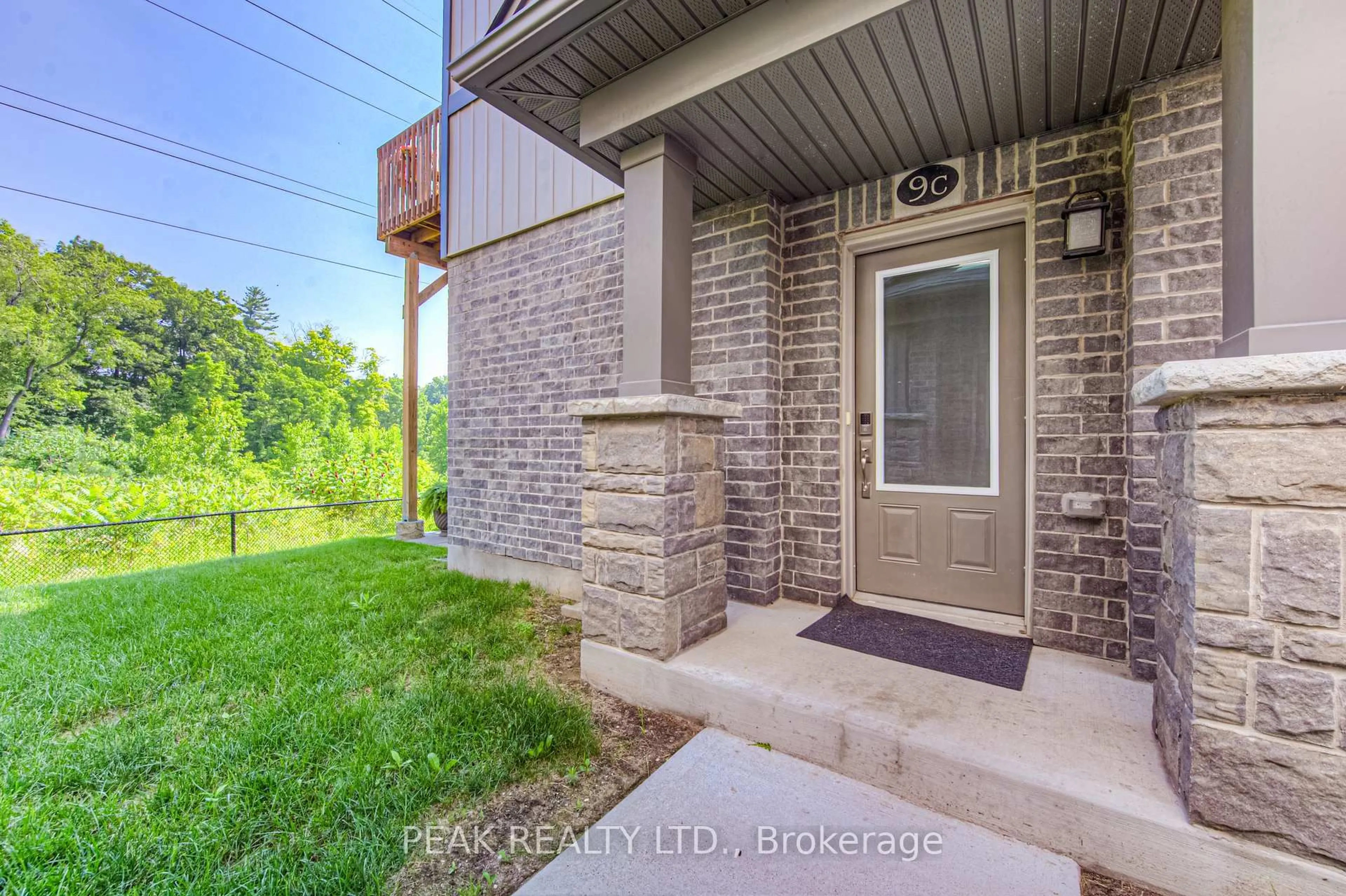 Home with brick exterior material, street for 115 South Creek Dr #9C, Kitchener Ontario N2P 0H2