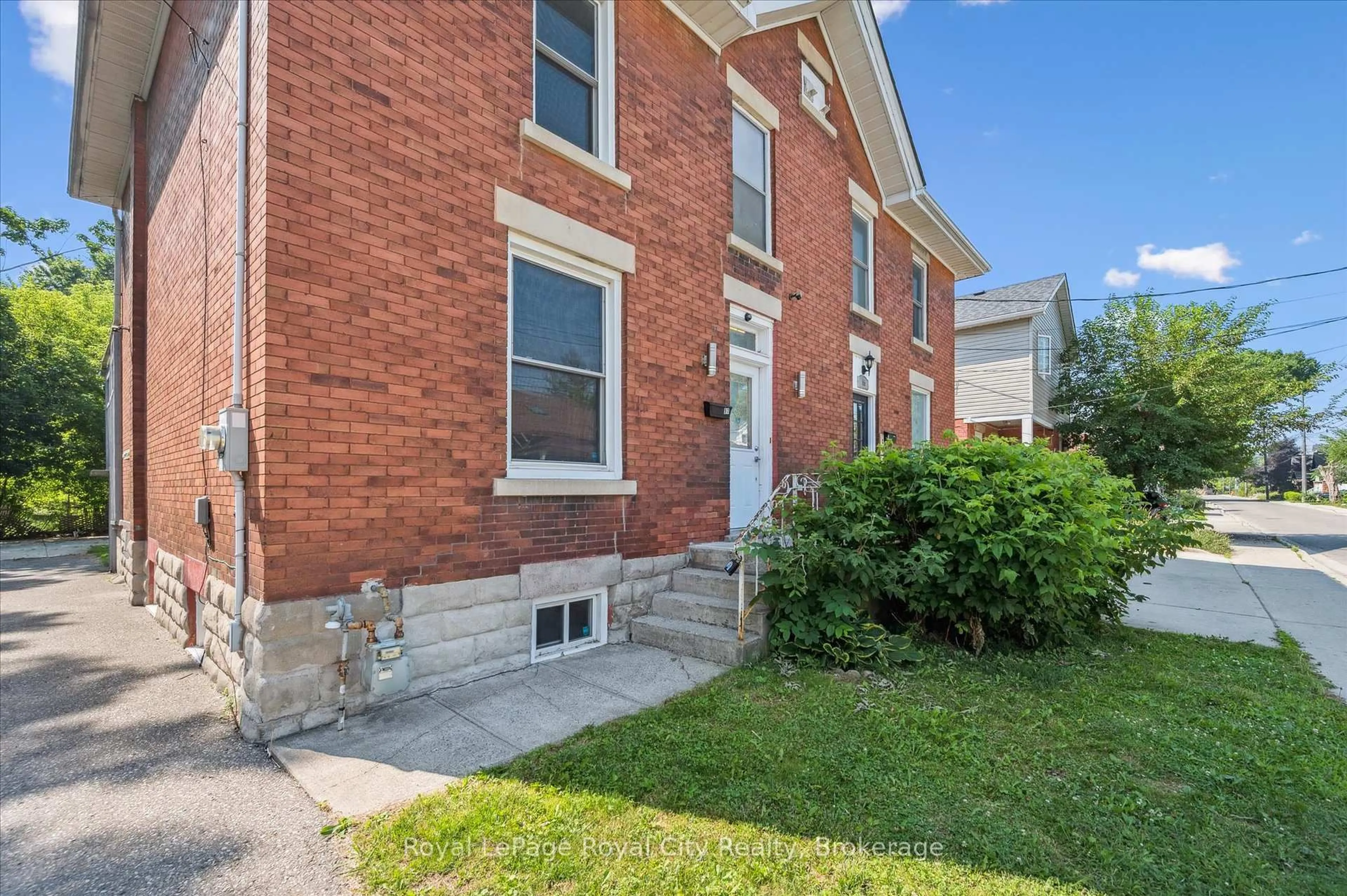 Home with brick exterior material, street for 97 Alice St, Guelph Ontario N1E 2Z7