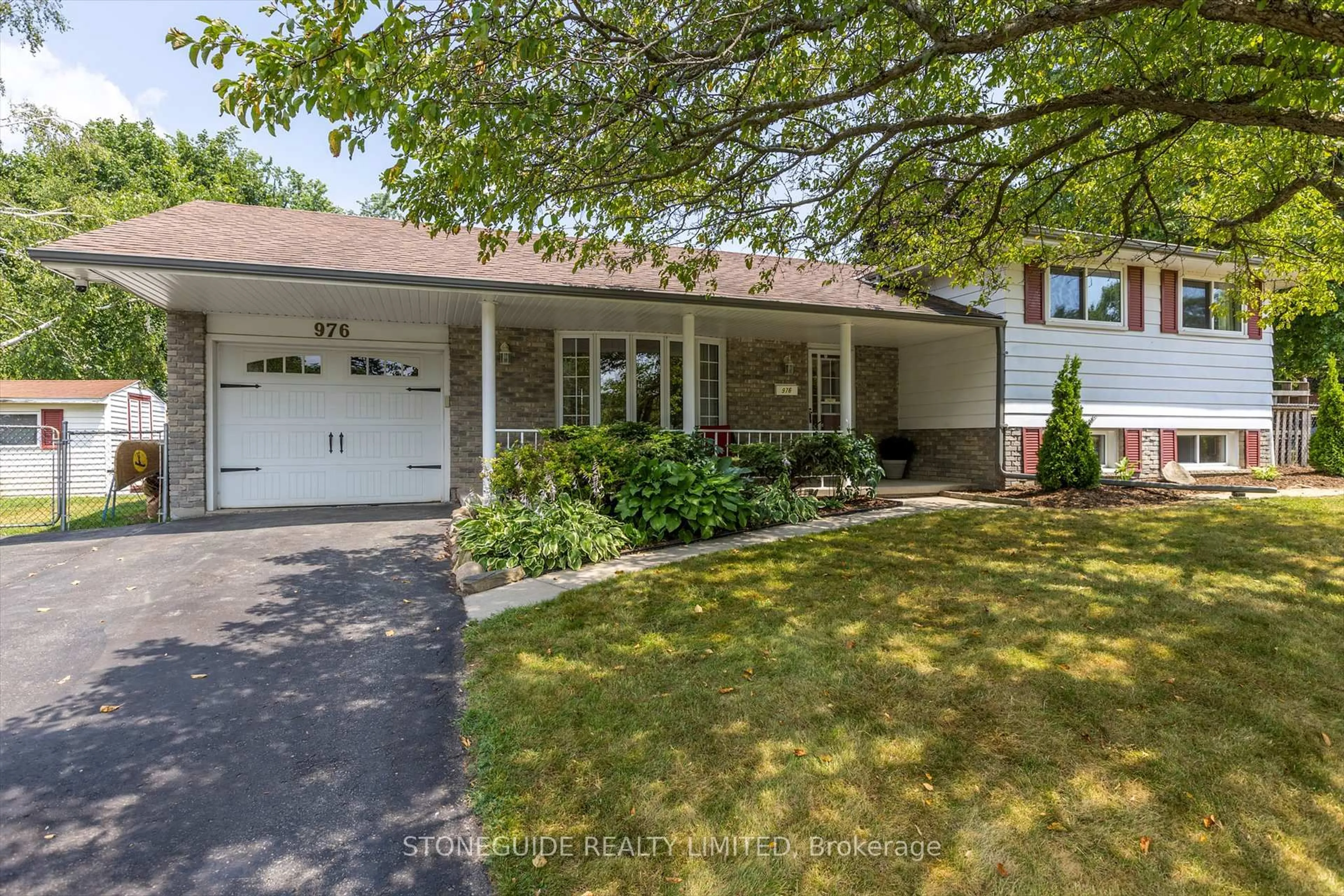 Home with vinyl exterior material, street for 976 Sydenham Rd, Peterborough South Ontario K9J 1K6