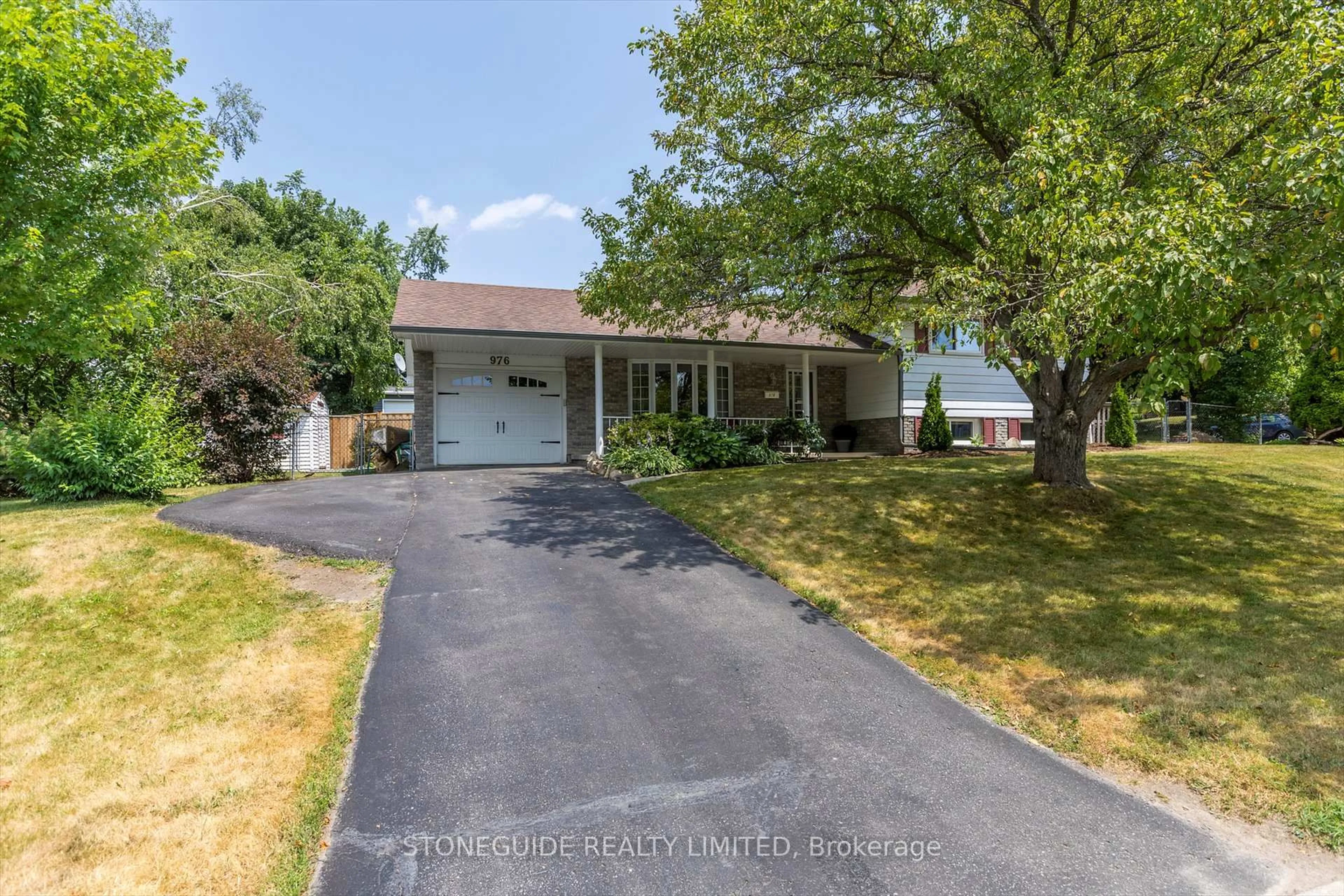 A pic from outside/outdoor area/front of a property/back of a property/a pic from drone, street for 976 Sydenham Rd, Peterborough South Ontario K9J 1K6