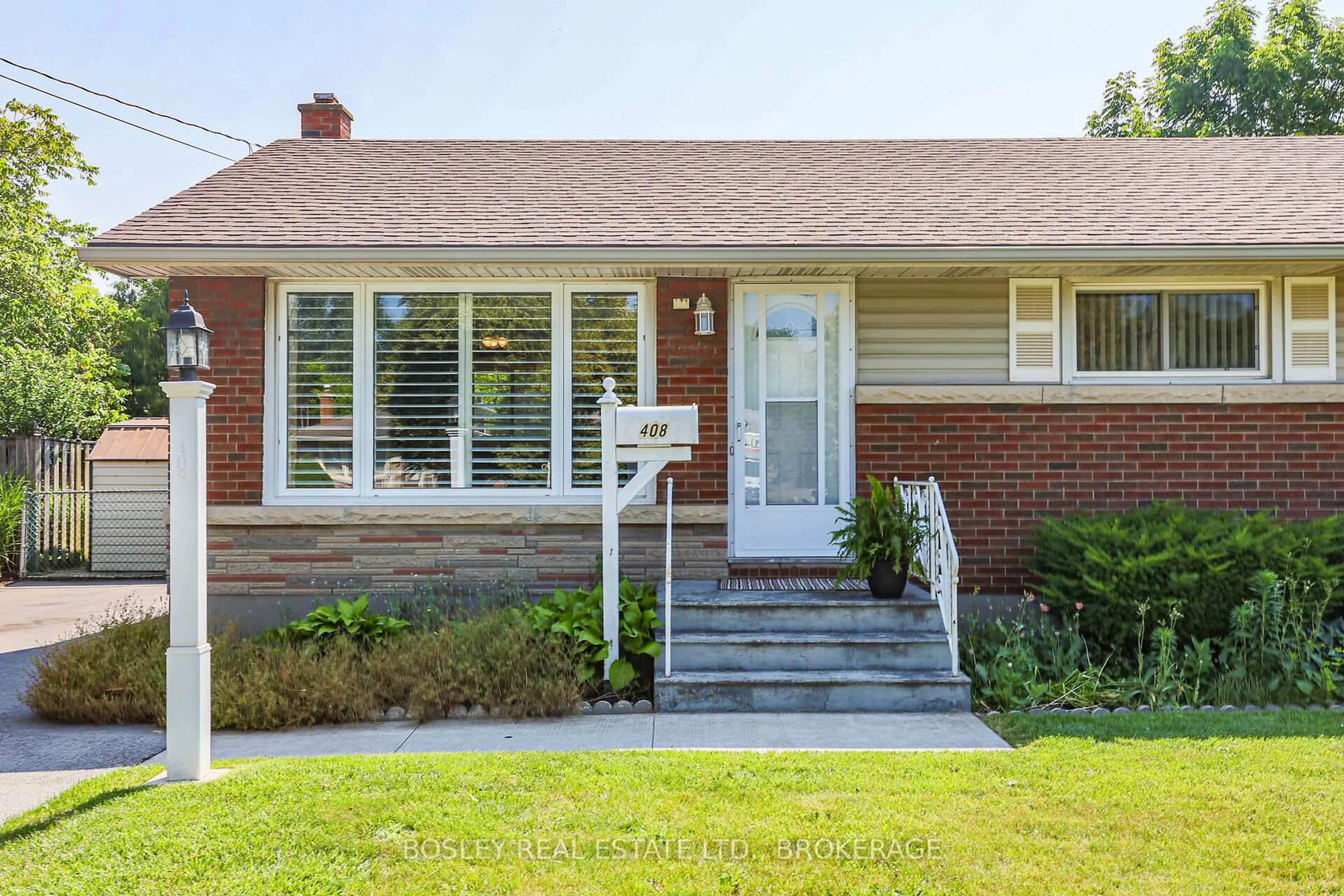 Home with brick exterior material, street for 408 Bunting Rd, St. Catharines Ontario L2M 3Z2
