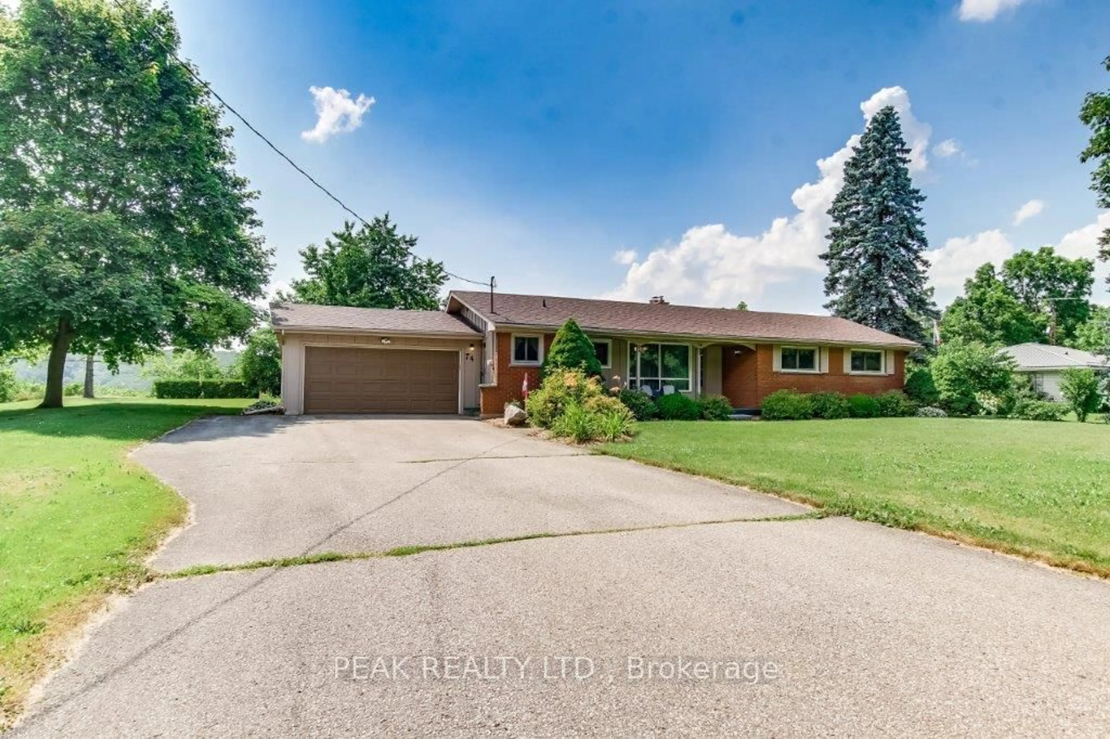 Home with brick exterior material, street for 74 Curtis Ave, Brant Ontario N3L 3J7