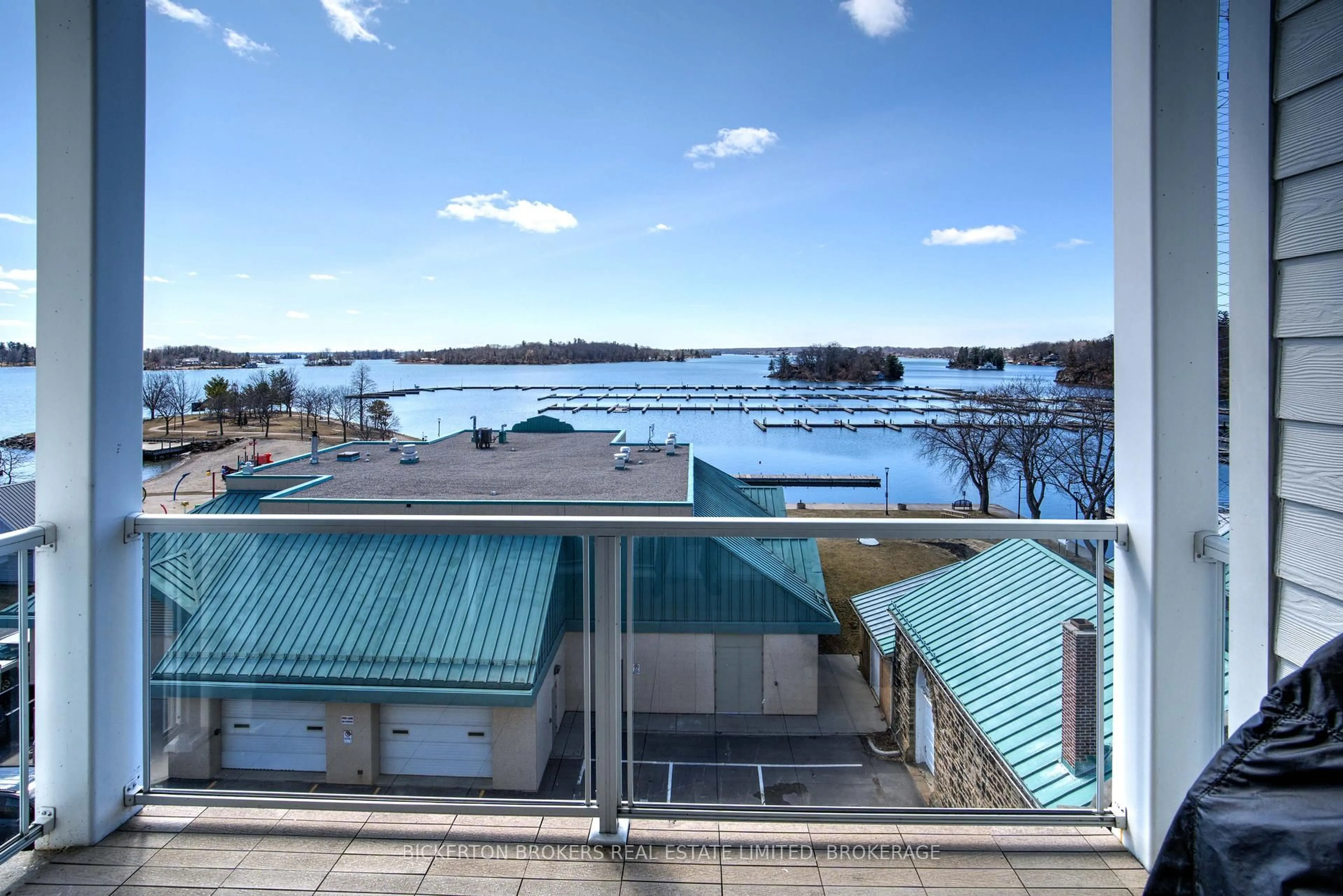 A pic from outside/outdoor area/front of a property/back of a property/a pic from drone, water/lake/river/ocean view for 130 Water St #403, Gananoque Ontario K7G 0A8