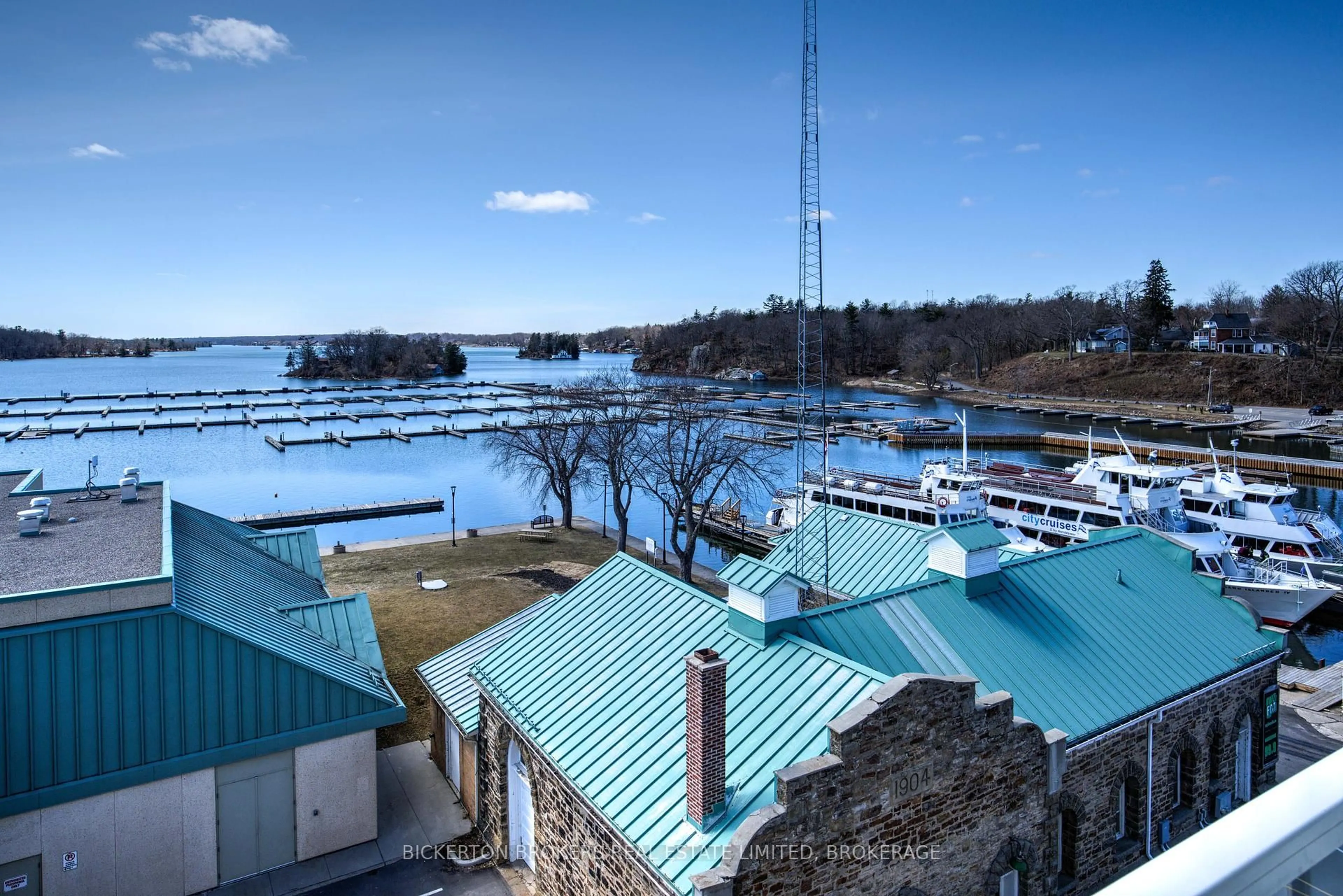A pic from outside/outdoor area/front of a property/back of a property/a pic from drone, water/lake/river/ocean view for 130 Water St #403, Gananoque Ontario K7G 0A8