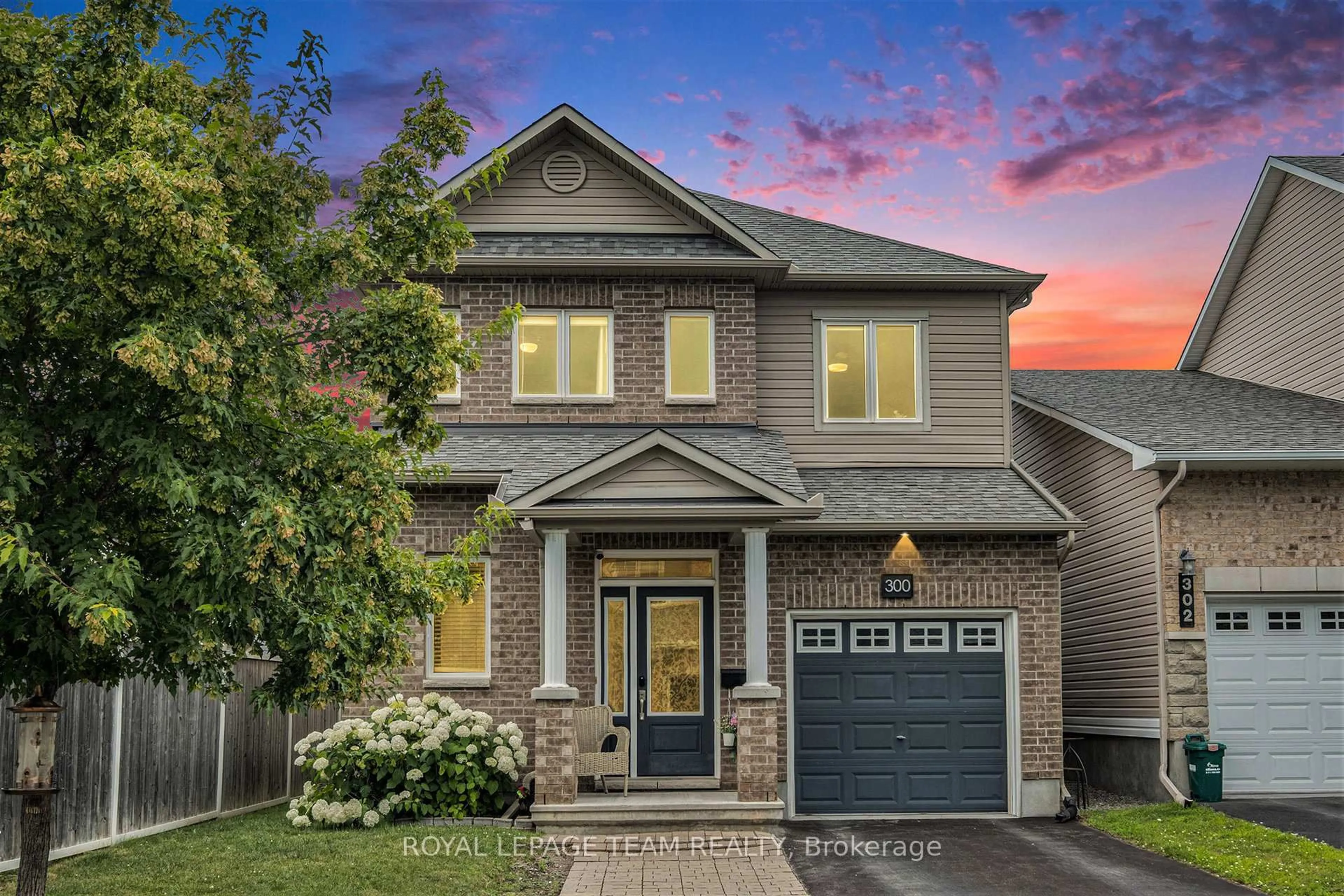 Home with brick exterior material, street for 300 Brettonwood Rdge, Ottawa Ontario K2H 0H8