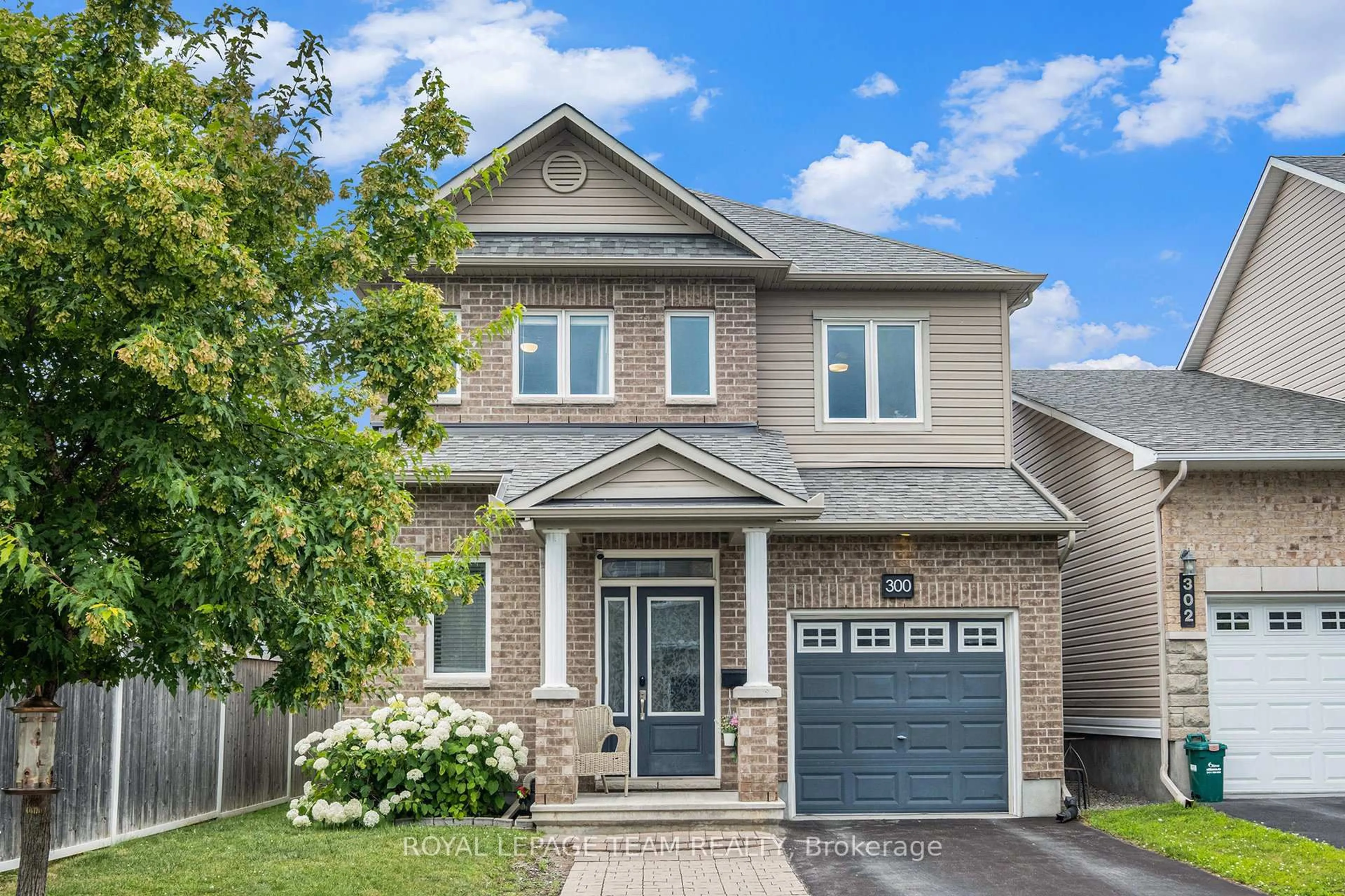 Home with brick exterior material, street for 300 Brettonwood Rdge, Ottawa Ontario K2H 0H8