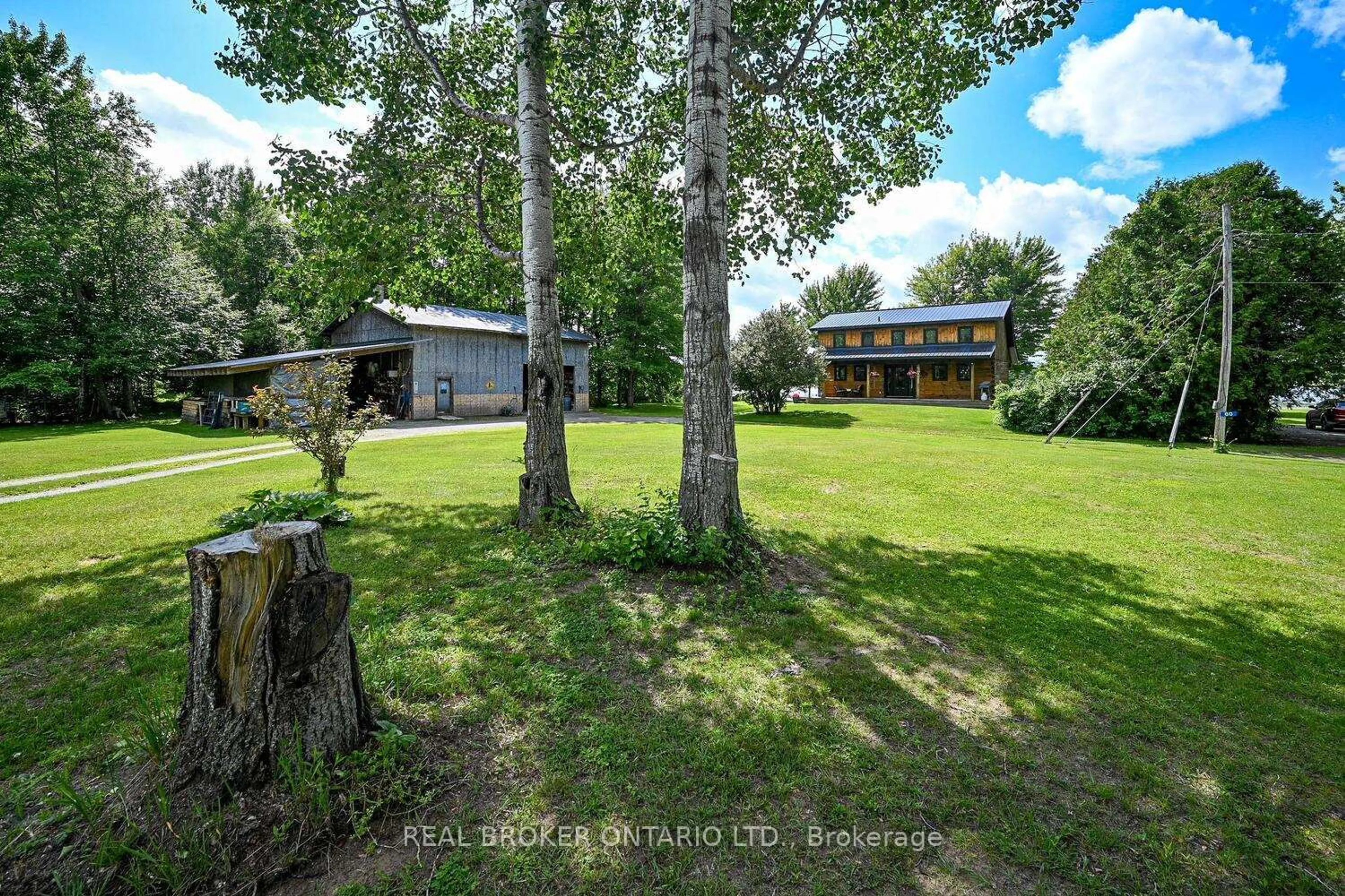 A pic from outside/outdoor area/front of a property/back of a property/a pic from drone, forest/trees view for 60 Corktown Lane, Merrickville-Wolford Ontario K0G 1N0