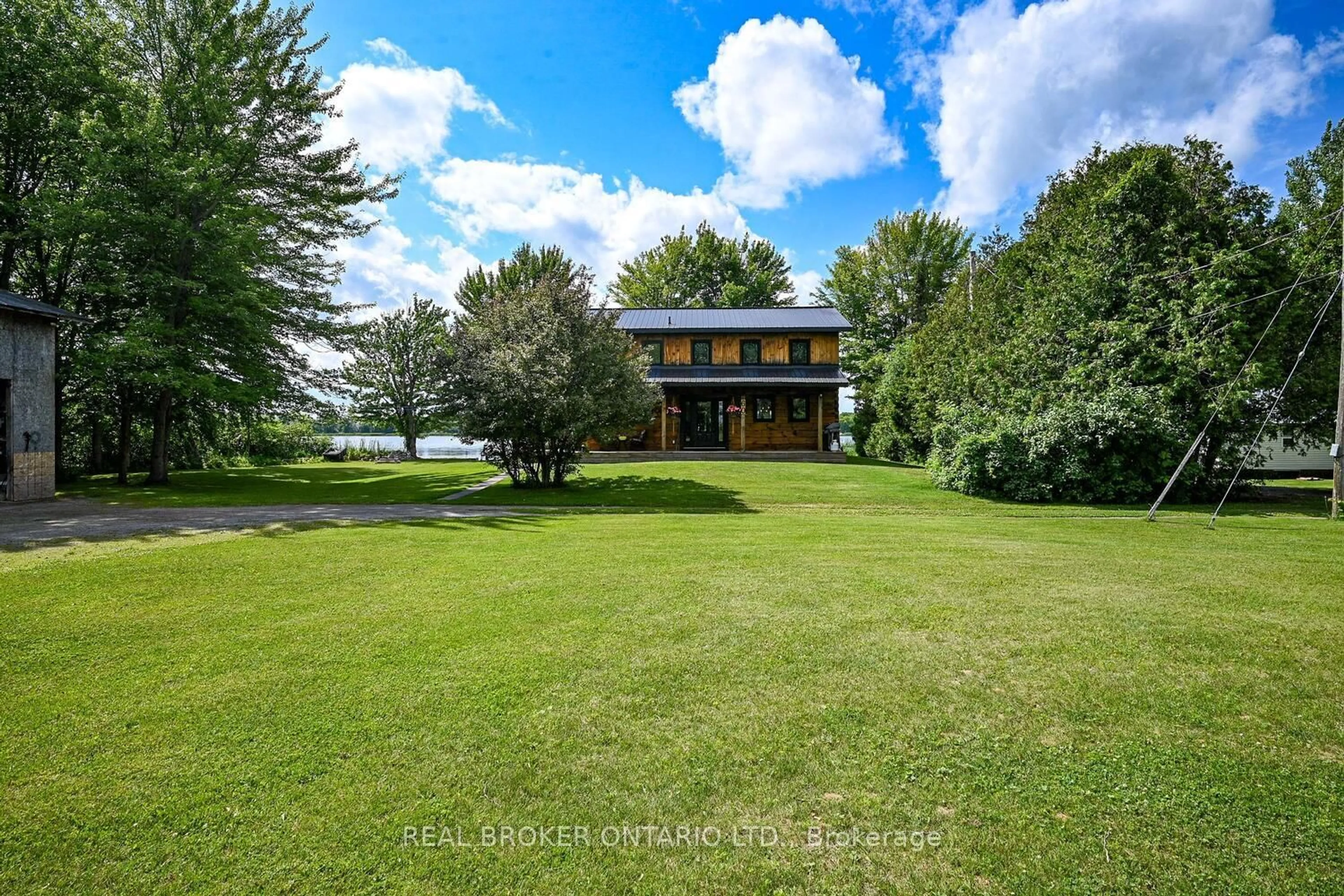 A pic from outside/outdoor area/front of a property/back of a property/a pic from drone, water/lake/river/ocean view for 60 Corktown Lane, Merrickville-Wolford Ontario K0G 1N0