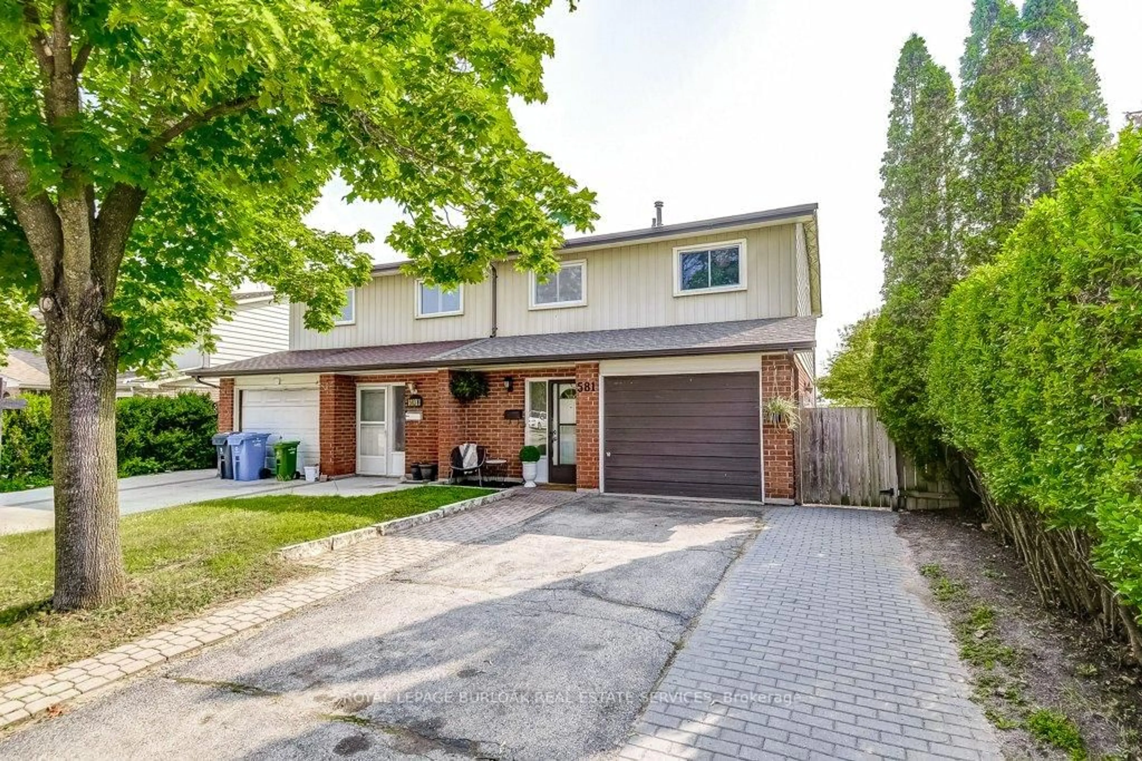 Home with brick exterior material, street for 581 College Ave, Guelph Ontario N1G 2Z6