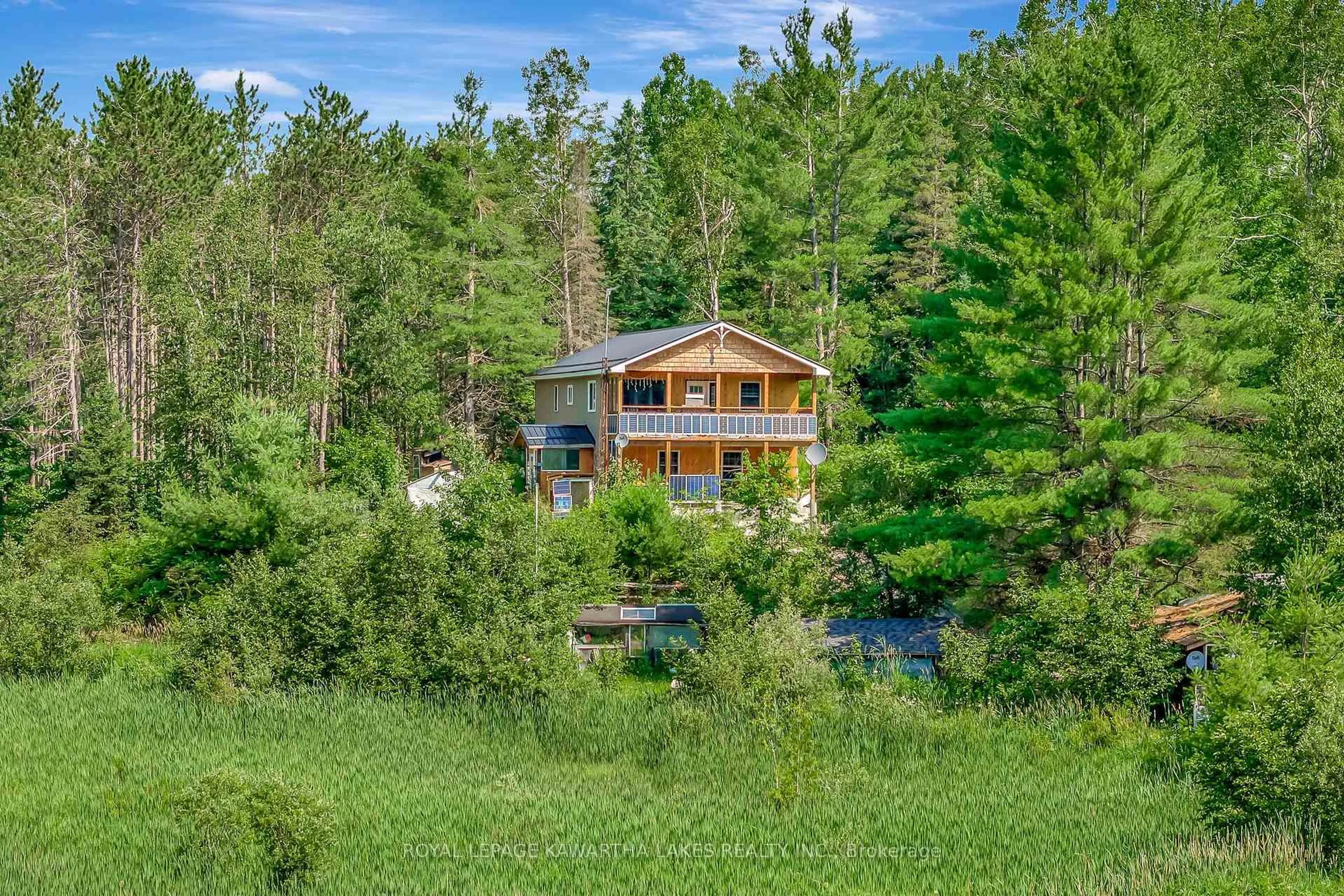 A pic from outside/outdoor area/front of a property/back of a property/a pic from drone, water/lake/river/ocean view for 707 Galway Rd, Trent Lakes Ontario K0M 2A0