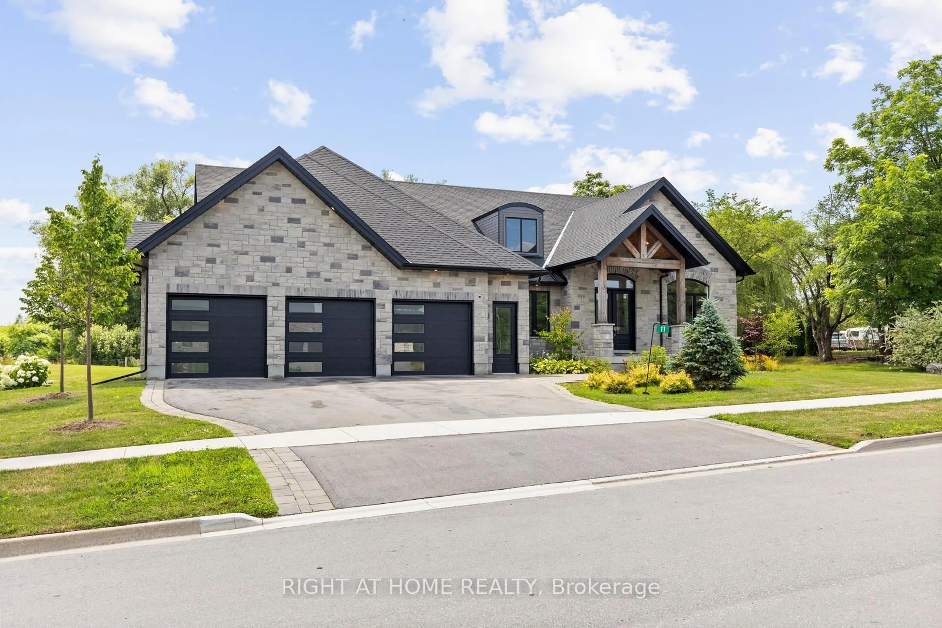 Home with brick exterior material, street for 11 Whitcombe Way, Puslinch Ontario N0B 2C0