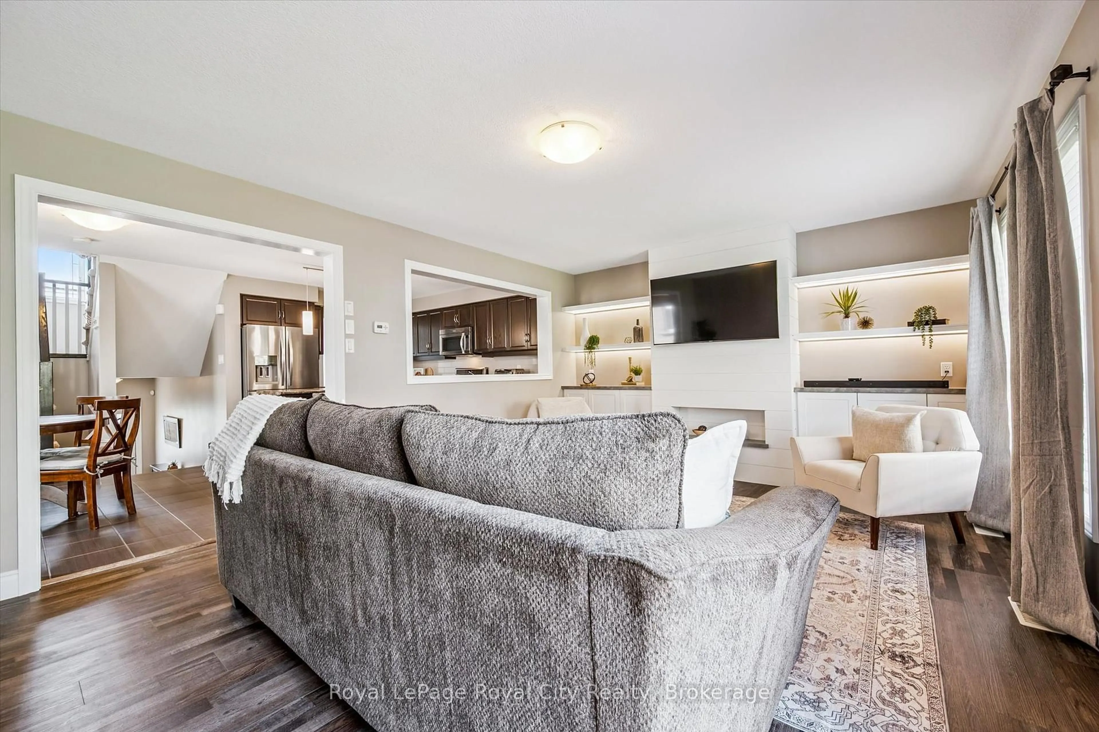 Living room with furniture, unknown for 31 Oakes Cres, Guelph Ontario N1E 0J6