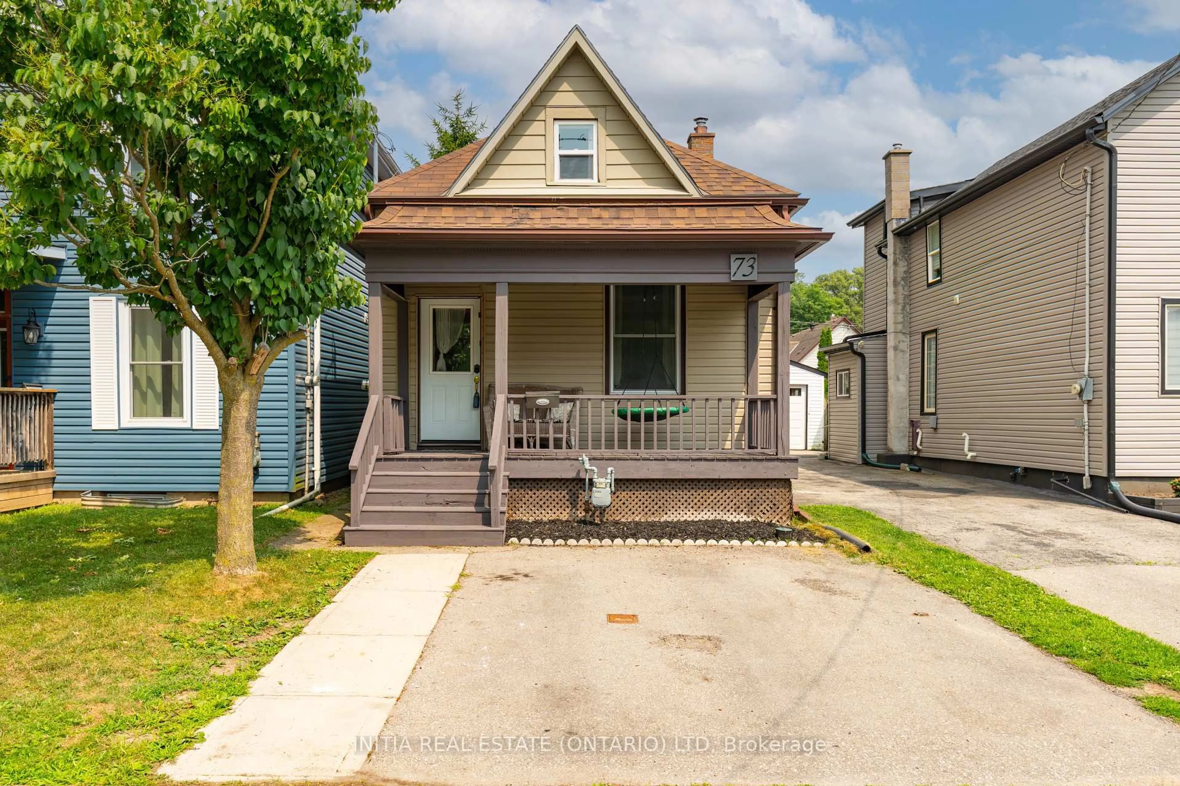 Home with vinyl exterior material, street for 73 Flora St, St. Thomas Ontario N5P 2X7