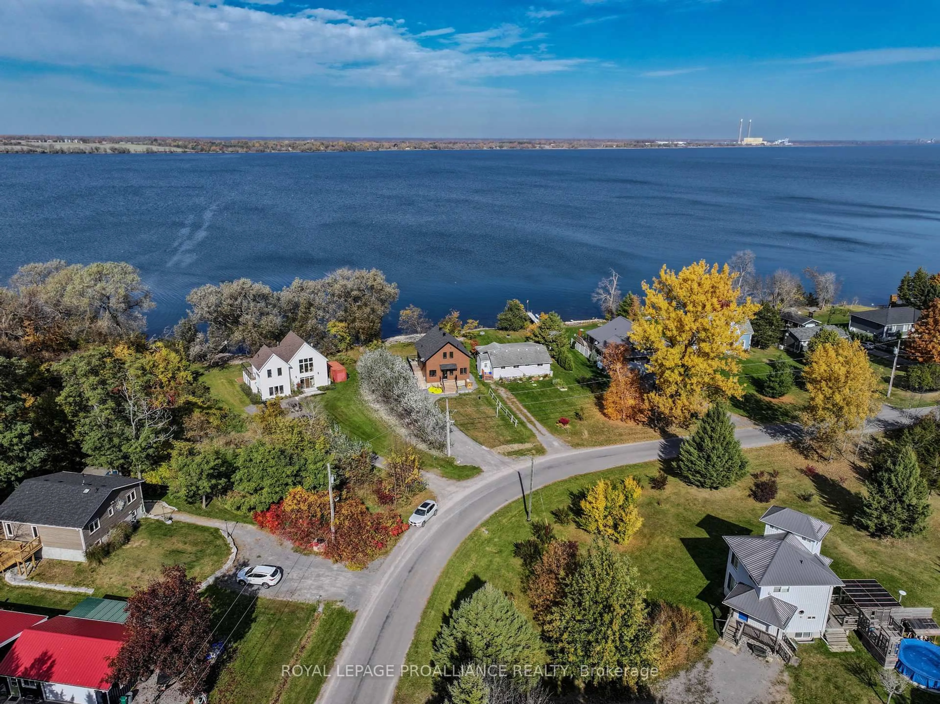 A pic from outside/outdoor area/front of a property/back of a property/a pic from drone, water/lake/river/ocean view for 209 Prinyers Cove Cres, Prince Edward County Ontario K0K 2T0