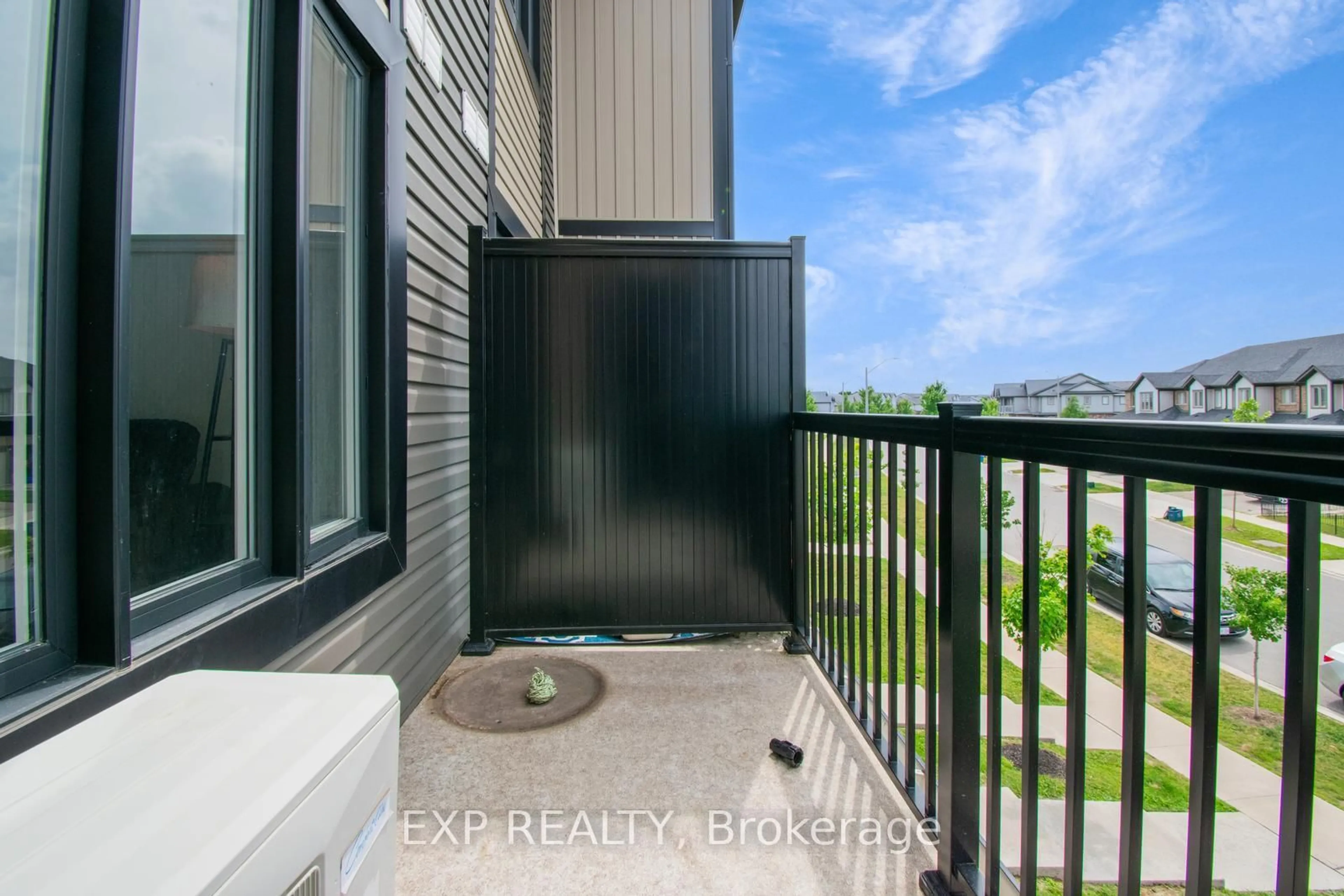 Balcony in the apartment, city buildings view from balcony for 150 ROCHEFORT St #E, Kitchener Ontario N2R 0P5