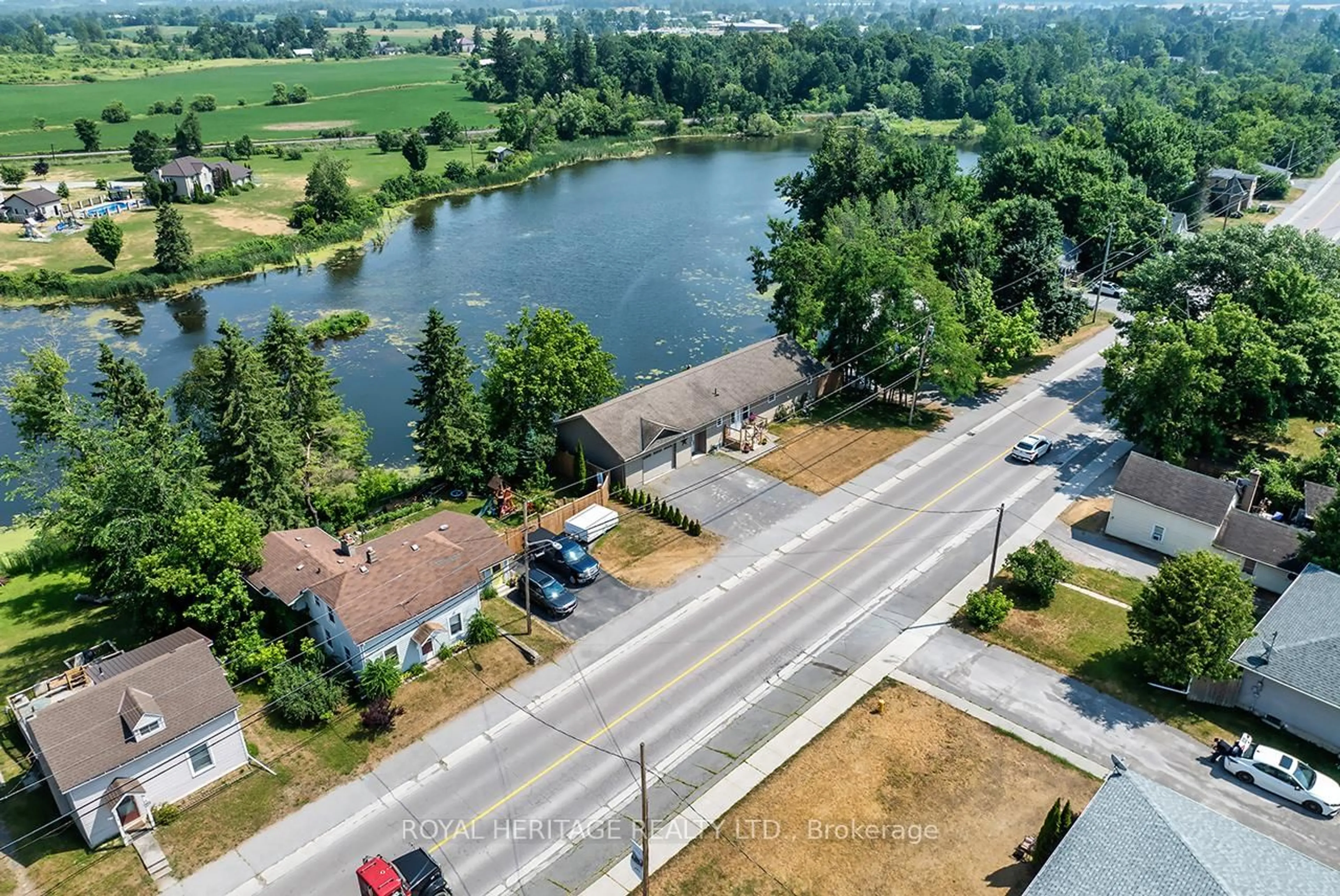 A pic from outside/outdoor area/front of a property/back of a property/a pic from drone, water/lake/river/ocean view for 4395 7 Highway, Asphodel-Norwood Ontario K0L 2V0