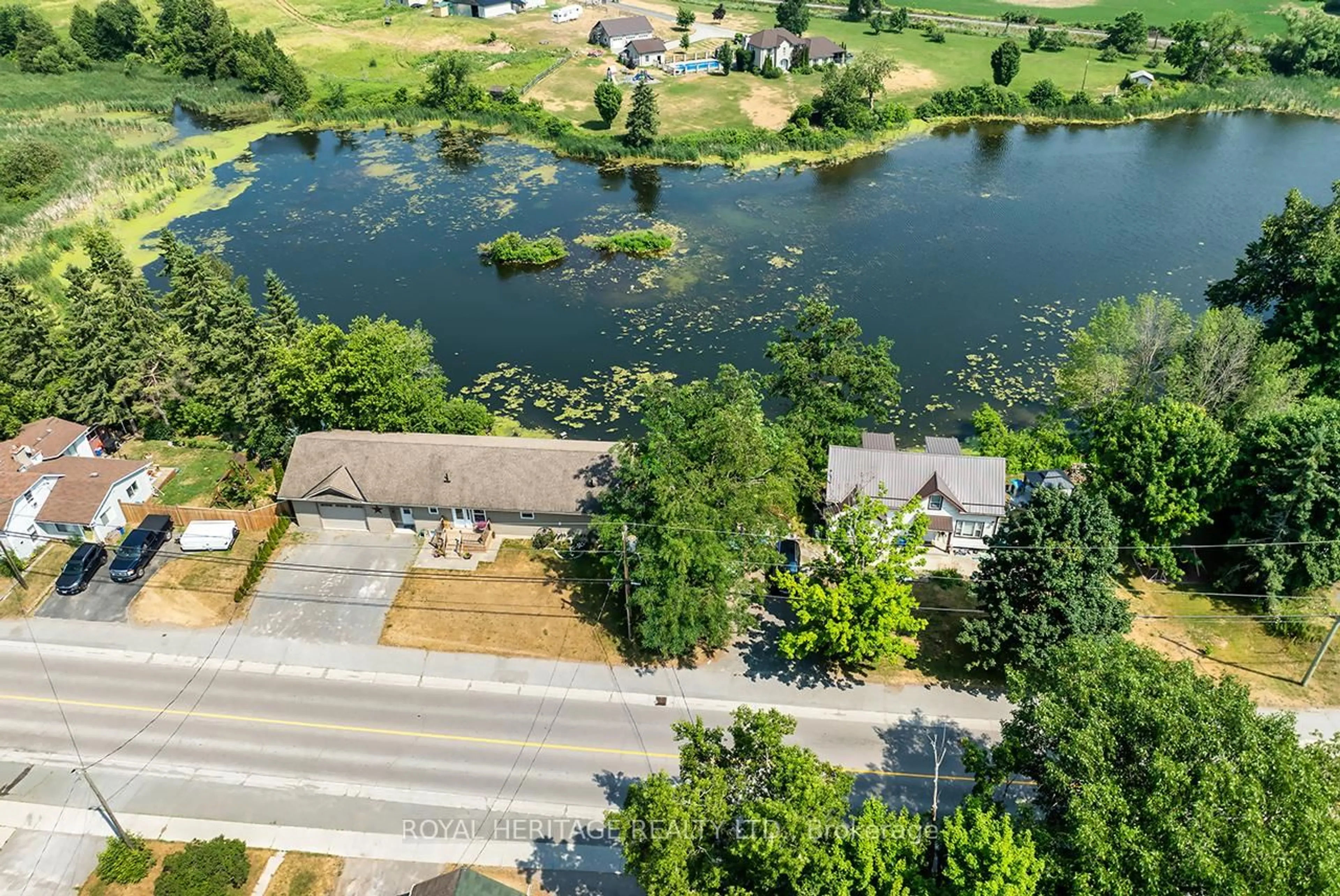 A pic from outside/outdoor area/front of a property/back of a property/a pic from drone, water/lake/river/ocean view for 4395 7 Highway, Asphodel-Norwood Ontario K0L 2V0