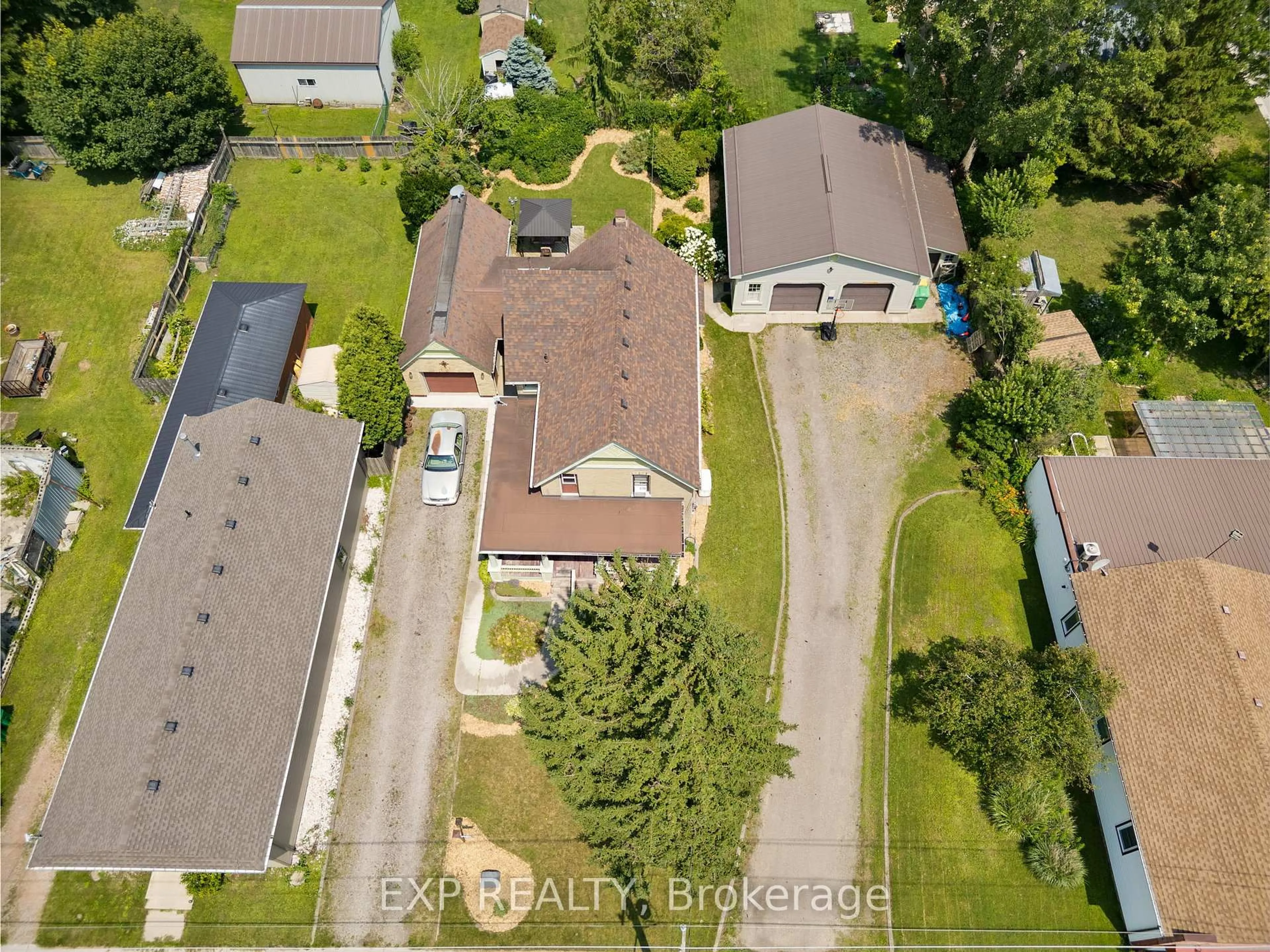 A pic from outside/outdoor area/front of a property/back of a property/a pic from drone, street for 22684 THAMES Rd, Southwest Middlesex Ontario N0L 1A0