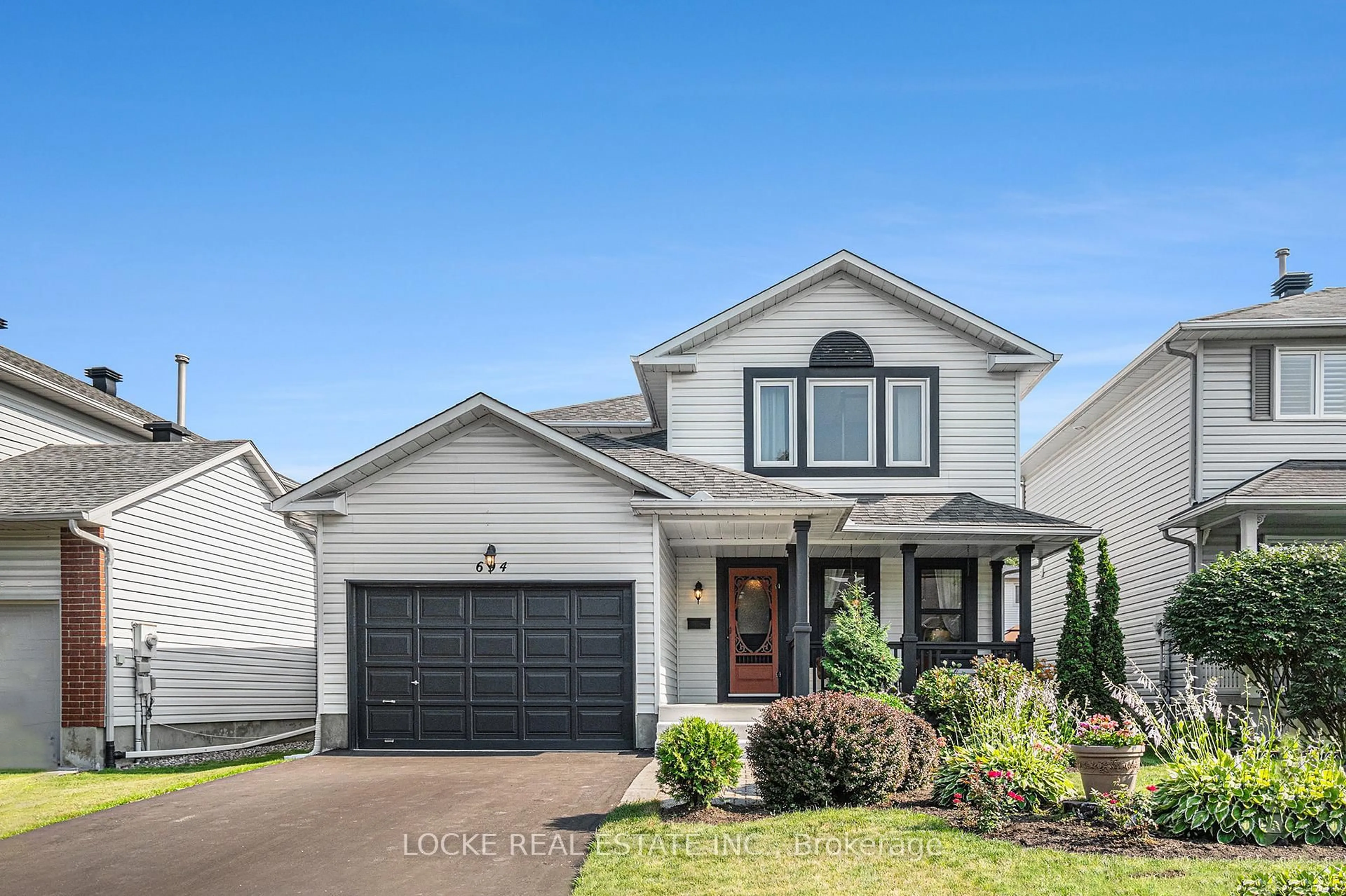 Home with vinyl exterior material, street for 694 Morewood Cres, Ottawa Ontario K4A 2P7