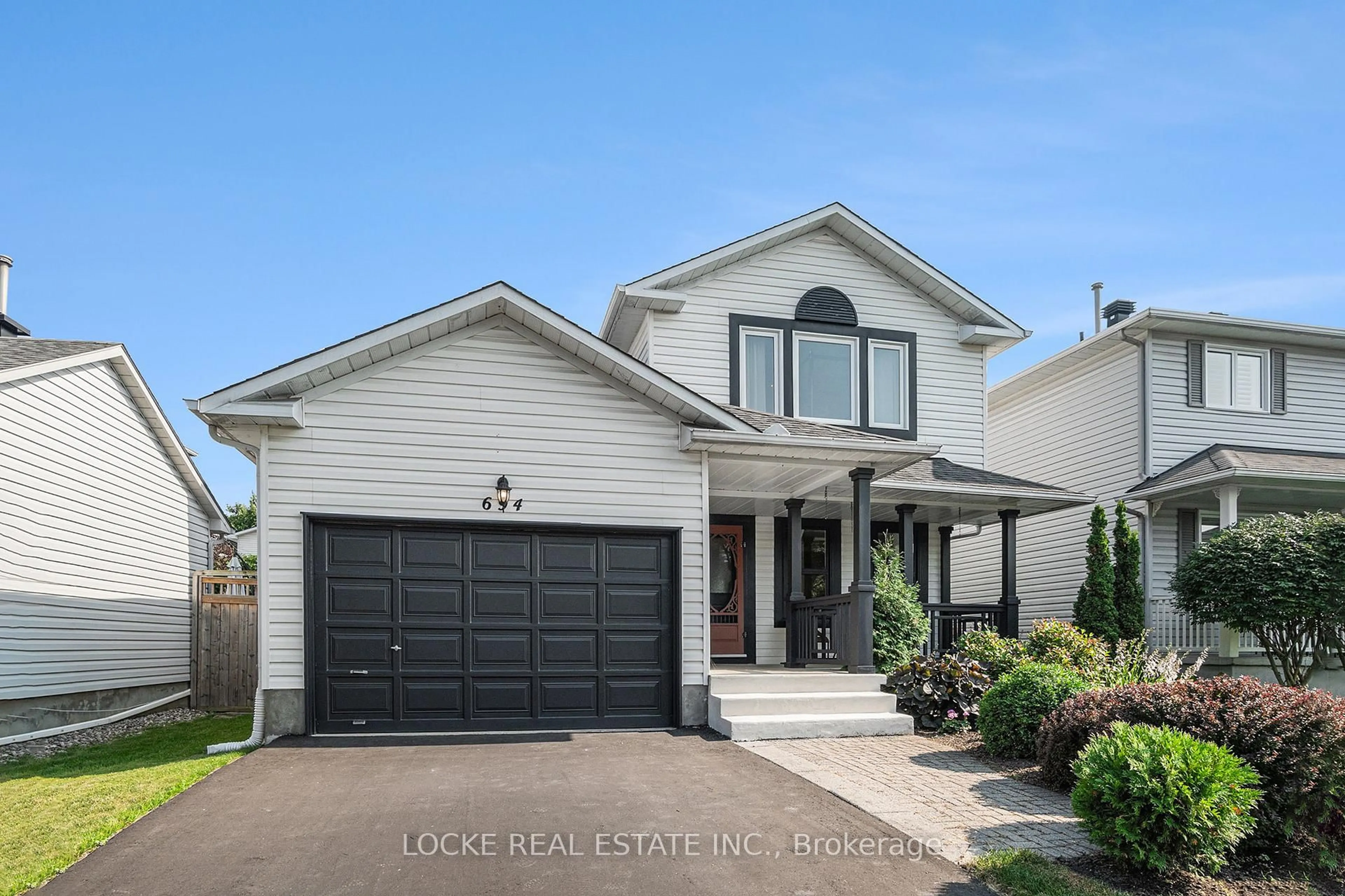 Home with vinyl exterior material, street for 694 Morewood Cres, Ottawa Ontario K4A 2P7