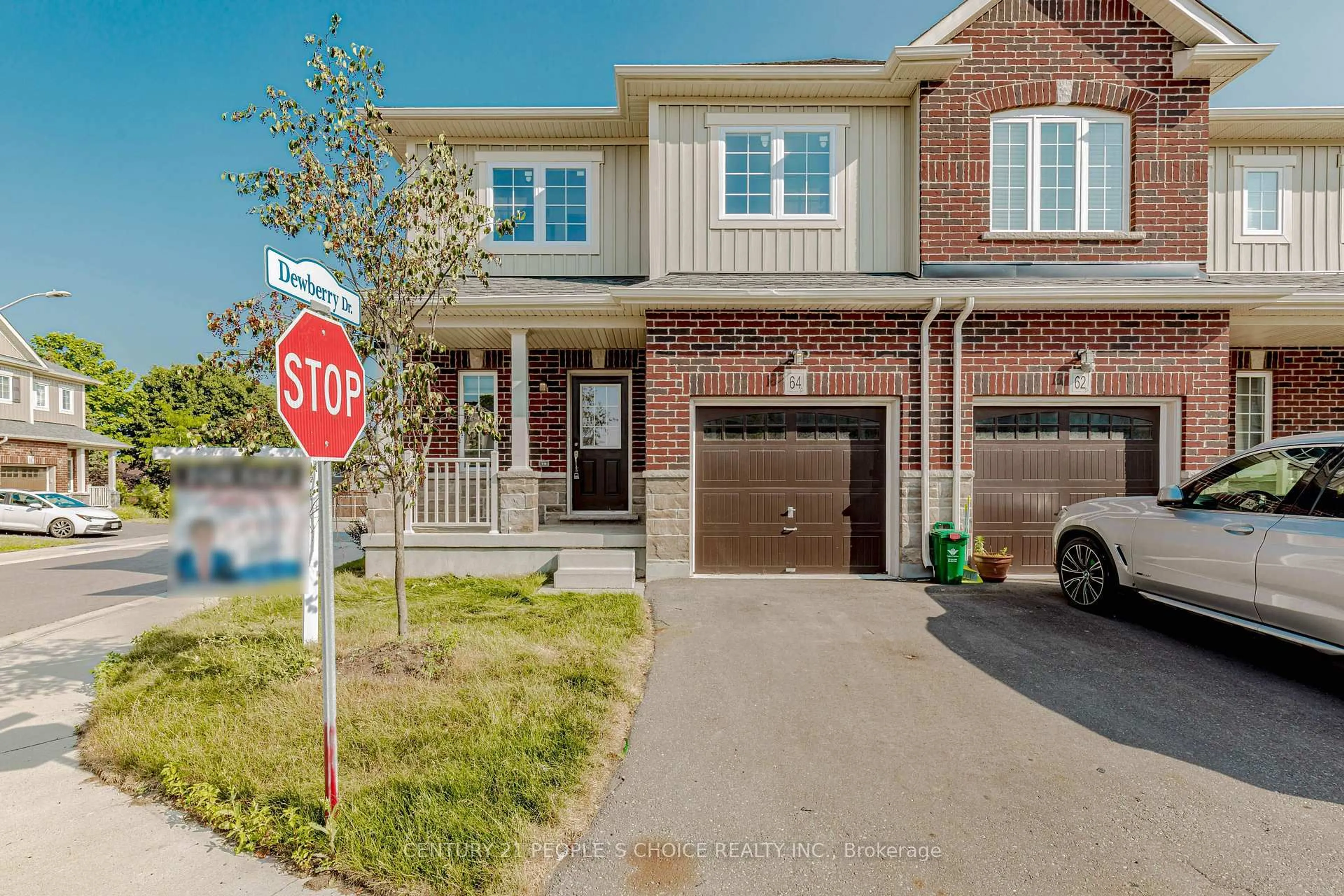 Home with brick exterior material, street for 64 Dewberry Dr, Kitchener Ontario N2B 0A9