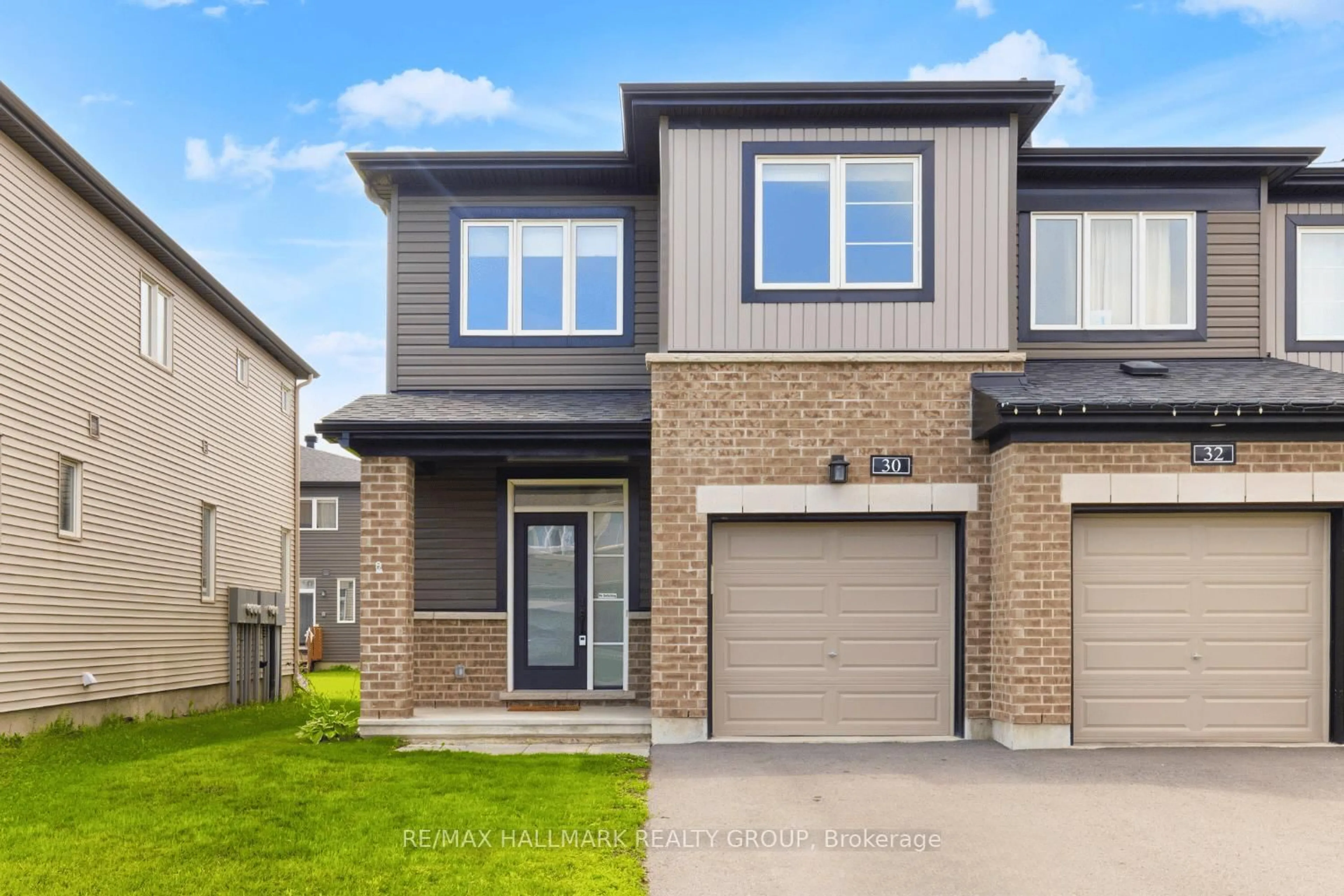 Home with brick exterior material, street for 30 Damselfish Walk, Ottawa Ontario K4A 5G6